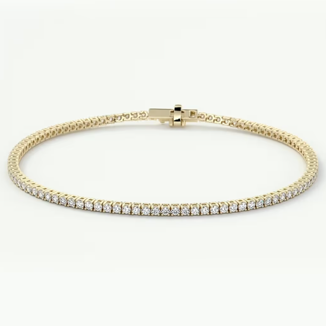 A yellow gold tennis bracelet featuring a row of round-cut clear gemstones on the front, displayed against a clean white background.