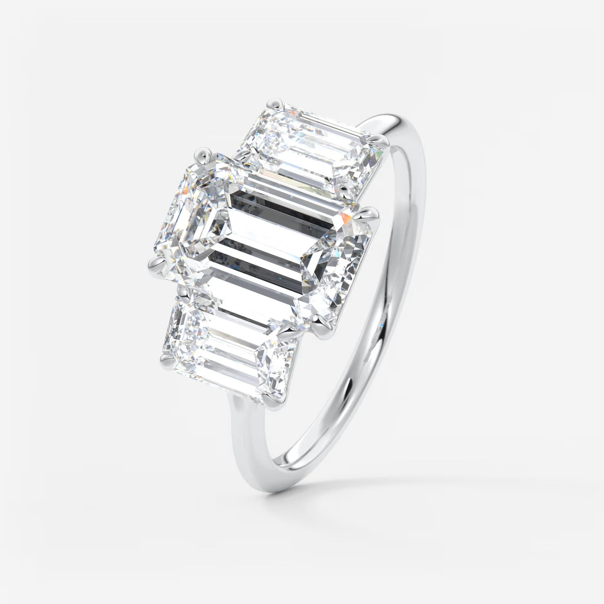 Amara emerald cathedral trilogy engagement ring