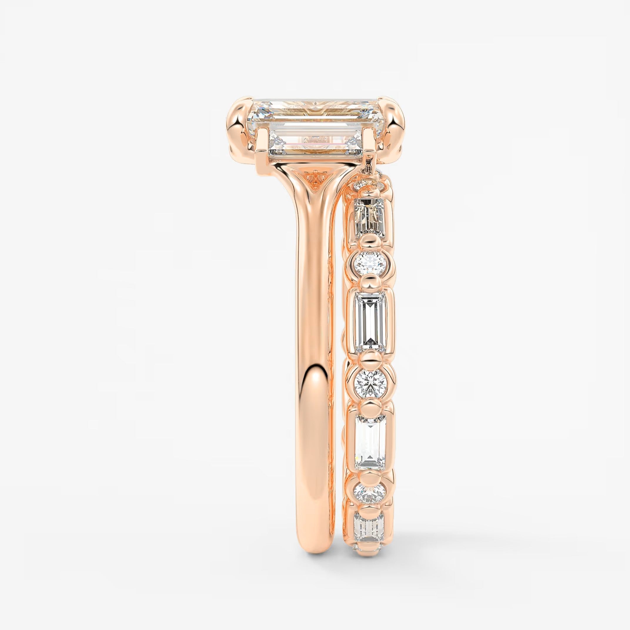 Aureline emerald baguette trilogy engagement ring