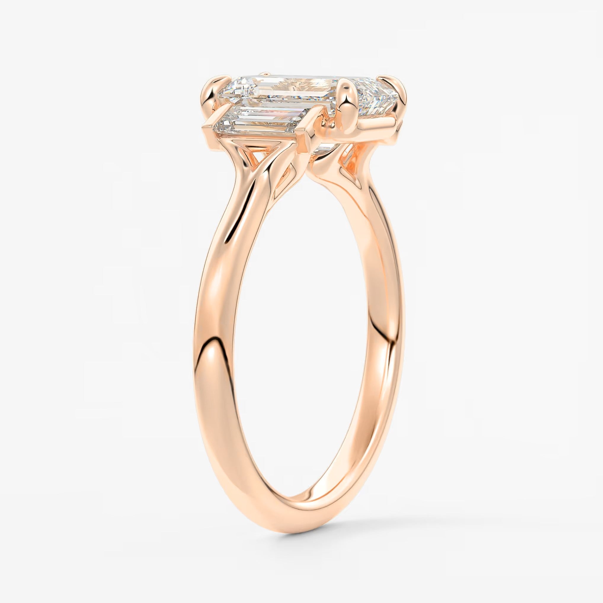 Aureline emerald baguette trilogy engagement ring