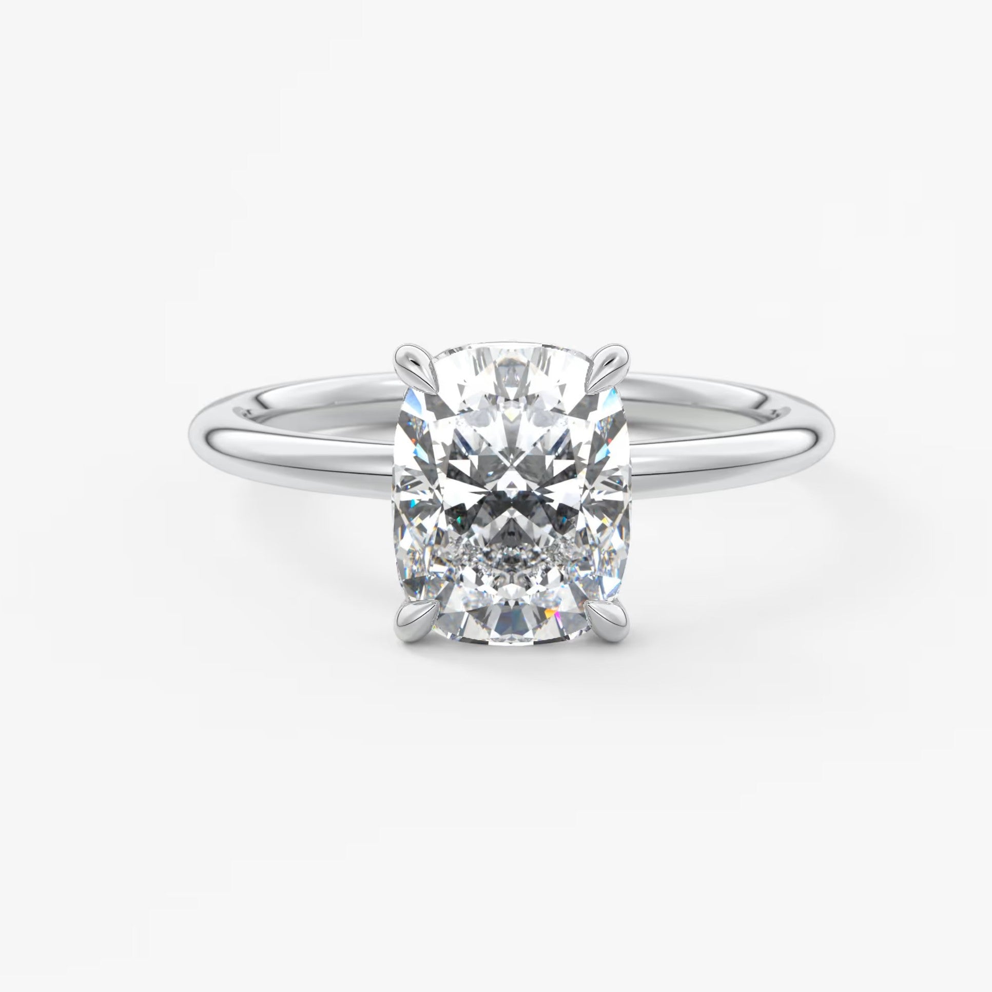 Aurora elongated cushion hidden halo engagement ring