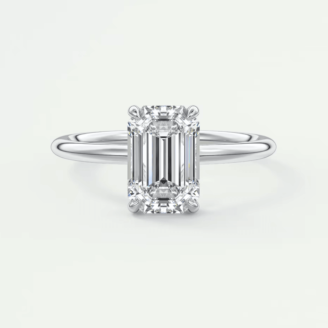 18k white gold emerald cut diamond engagement ring.