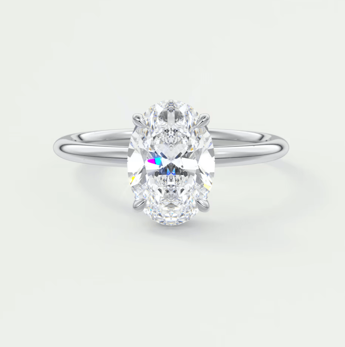 Silver skull ring with clear gemstone