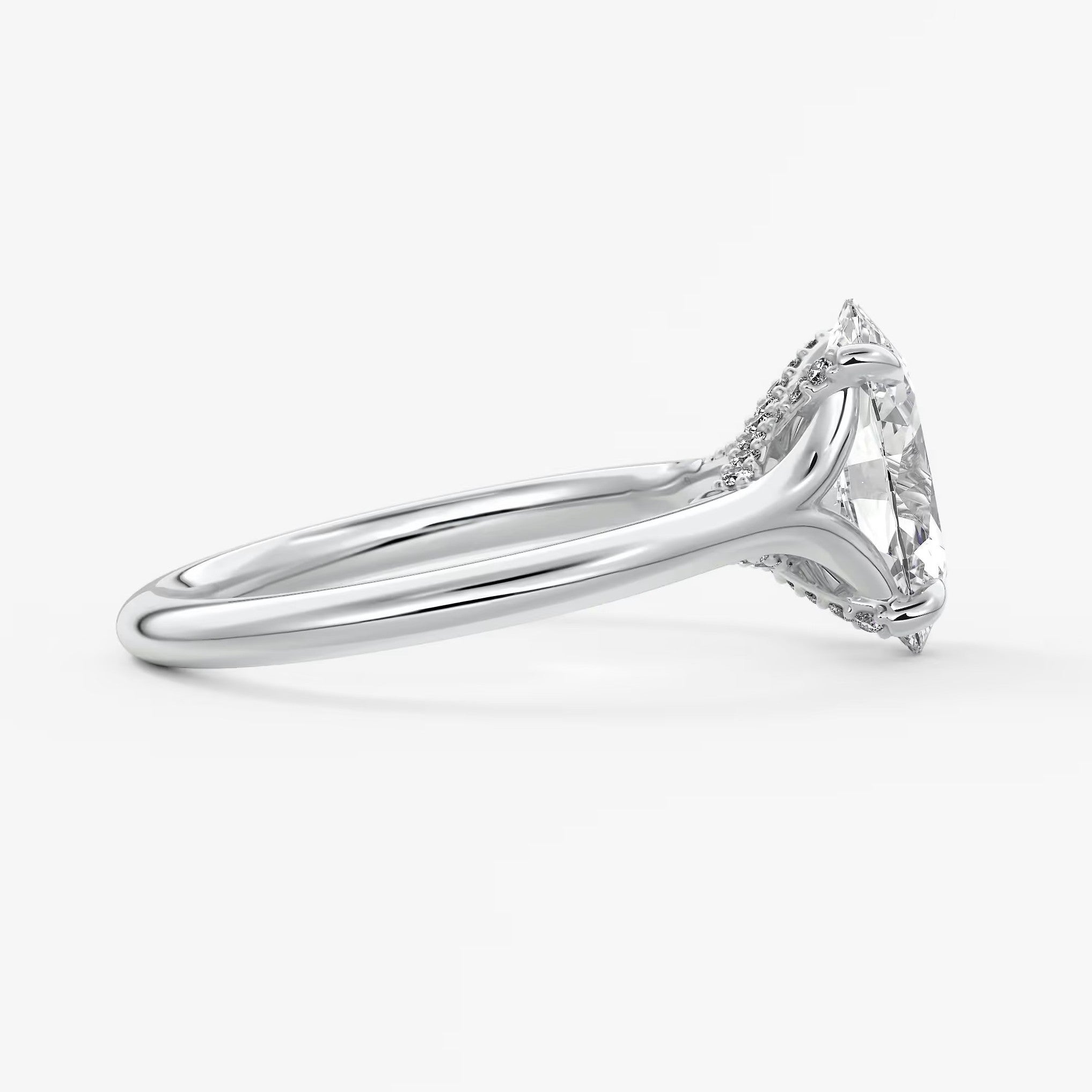 Cassia – oval solitaire with hidden pavé