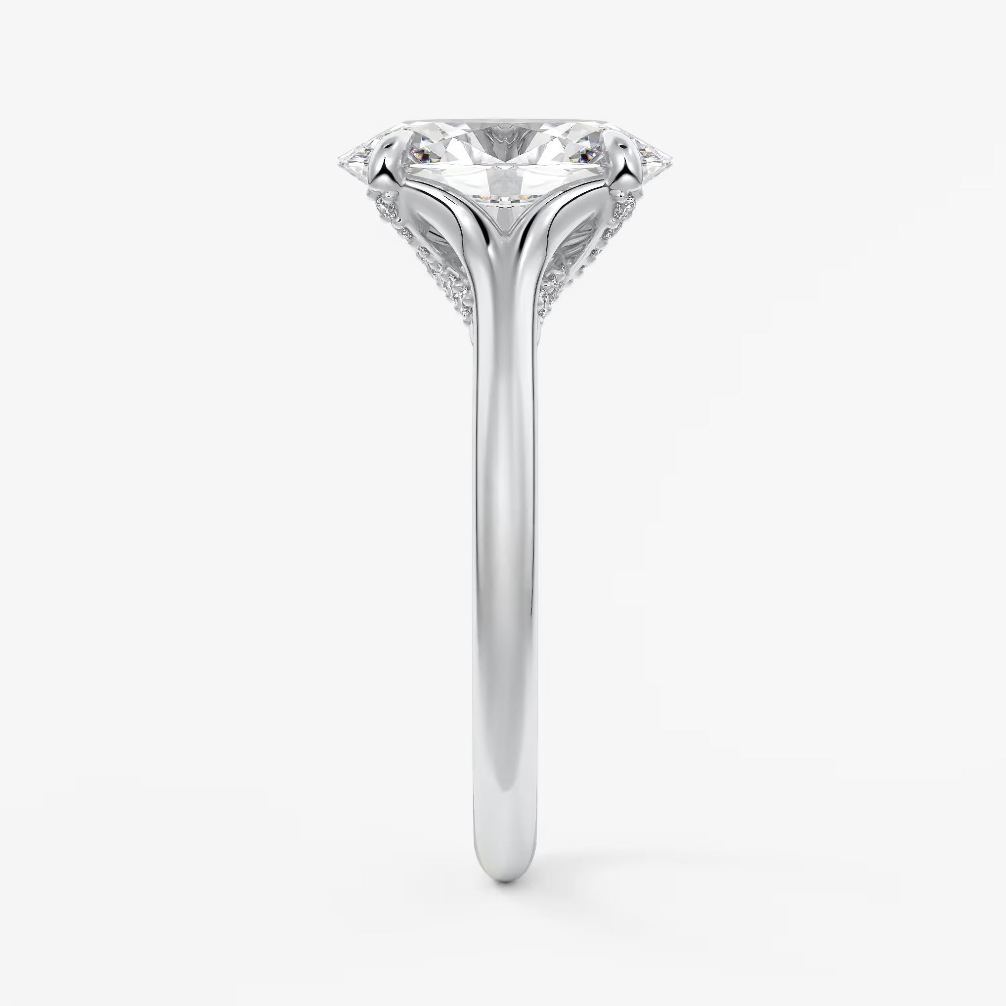 Cassia – oval solitaire with hidden pavé