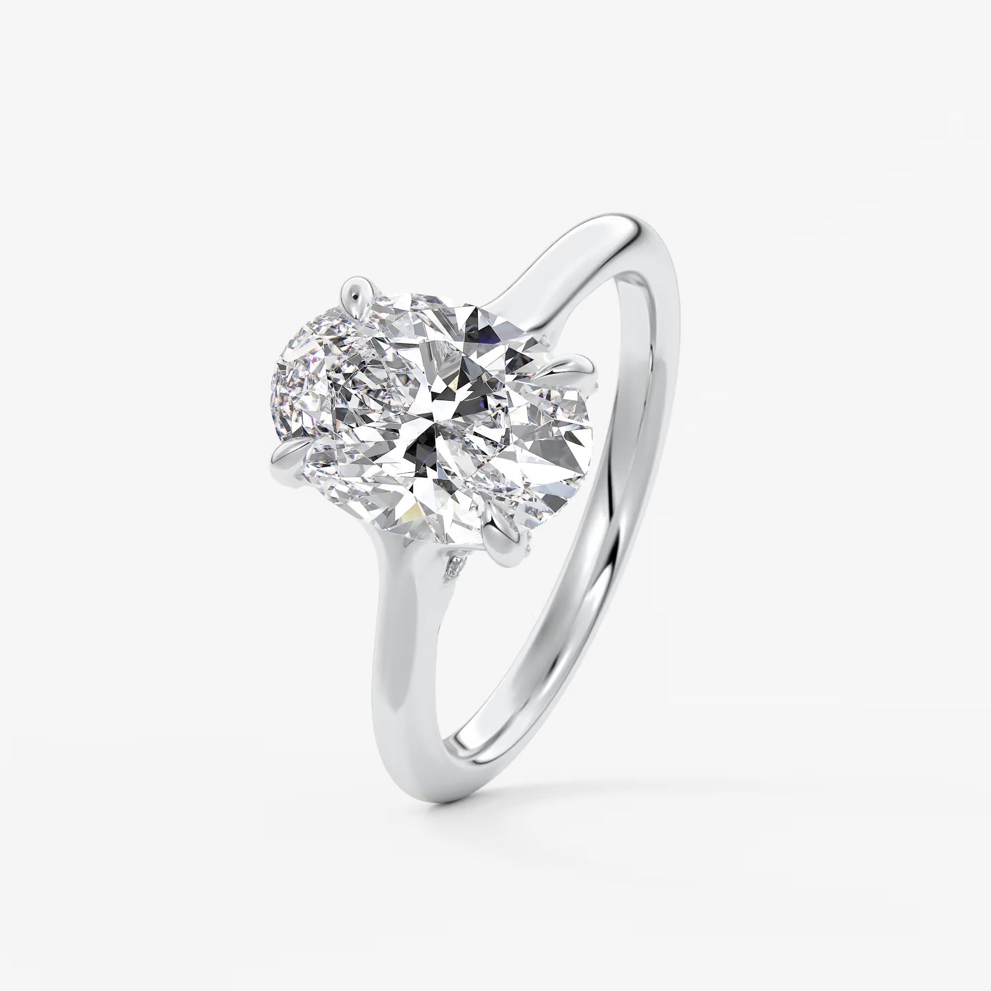 Cassia – oval solitaire with hidden pavé