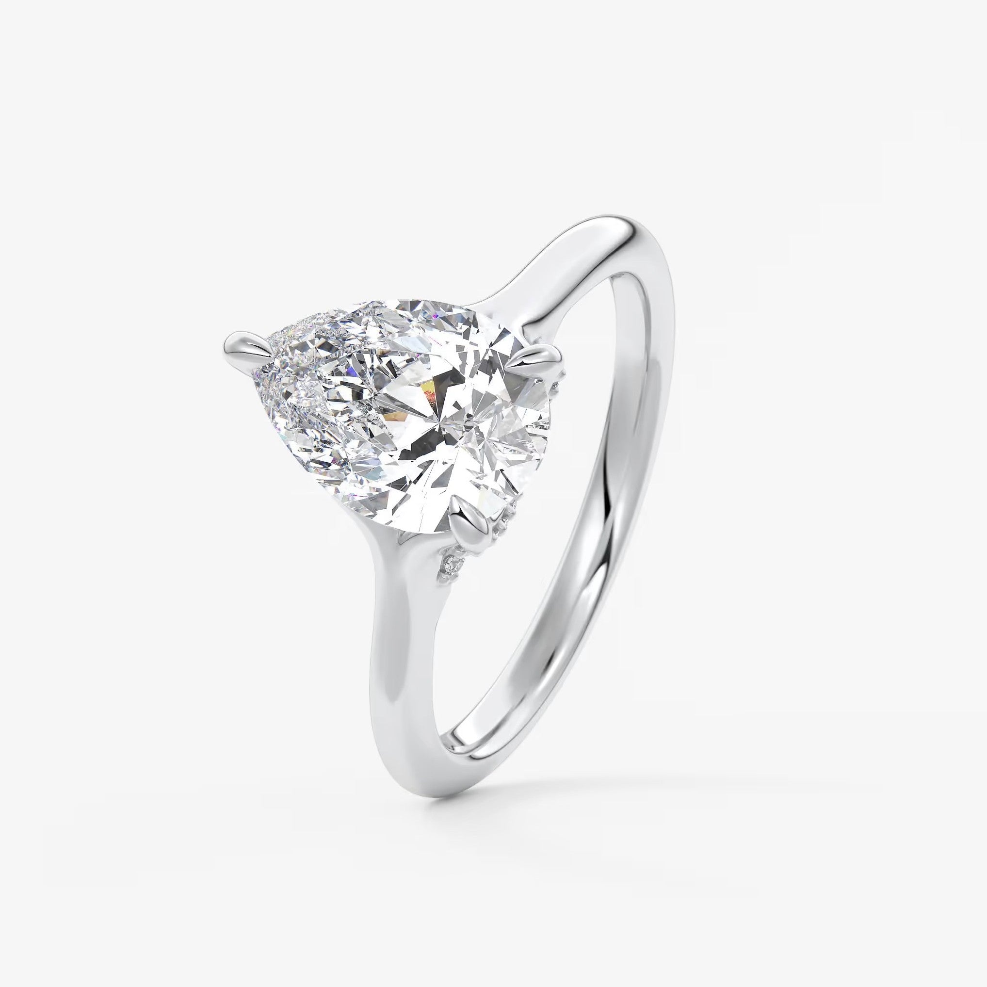 Cassia – pear solitaire with hidden pavé