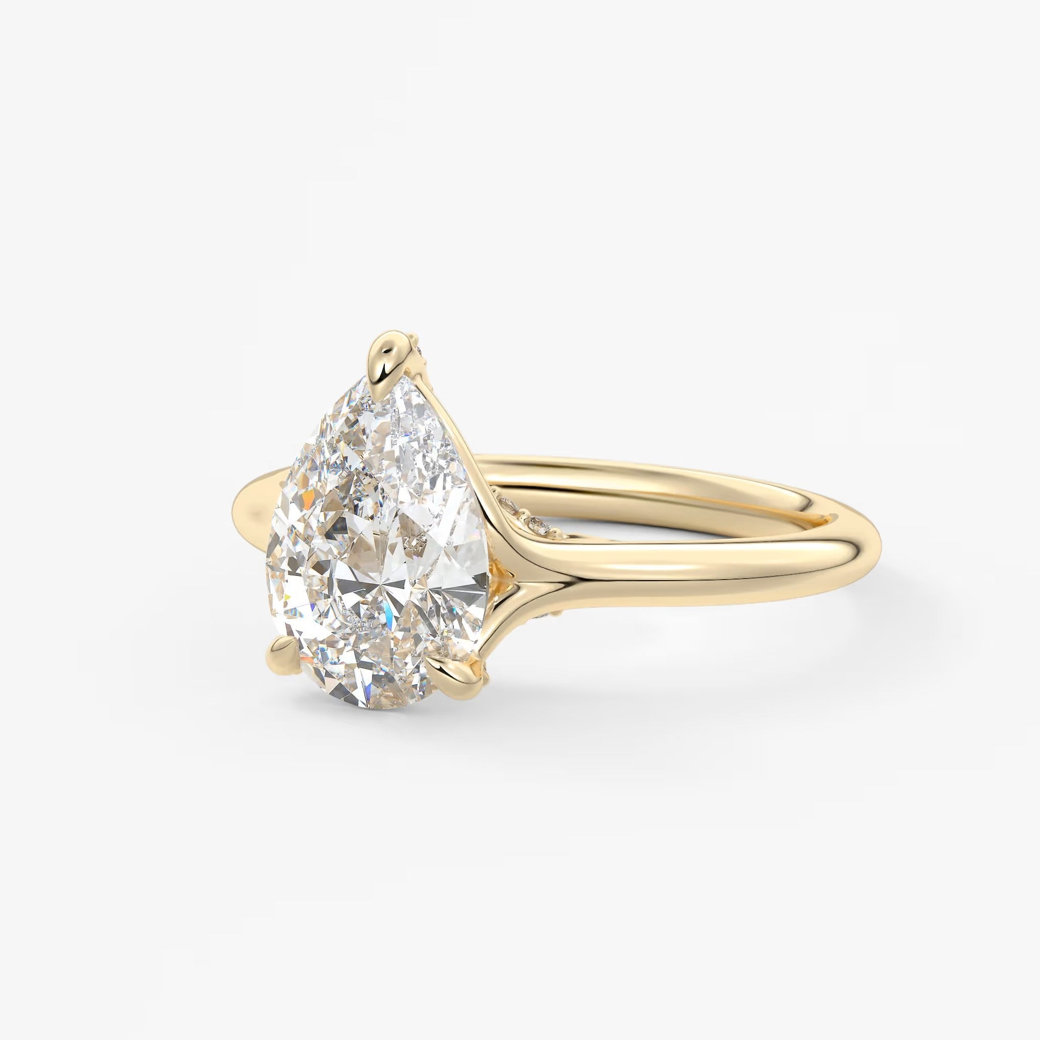 Cassia – pear solitaire with hidden pavé
