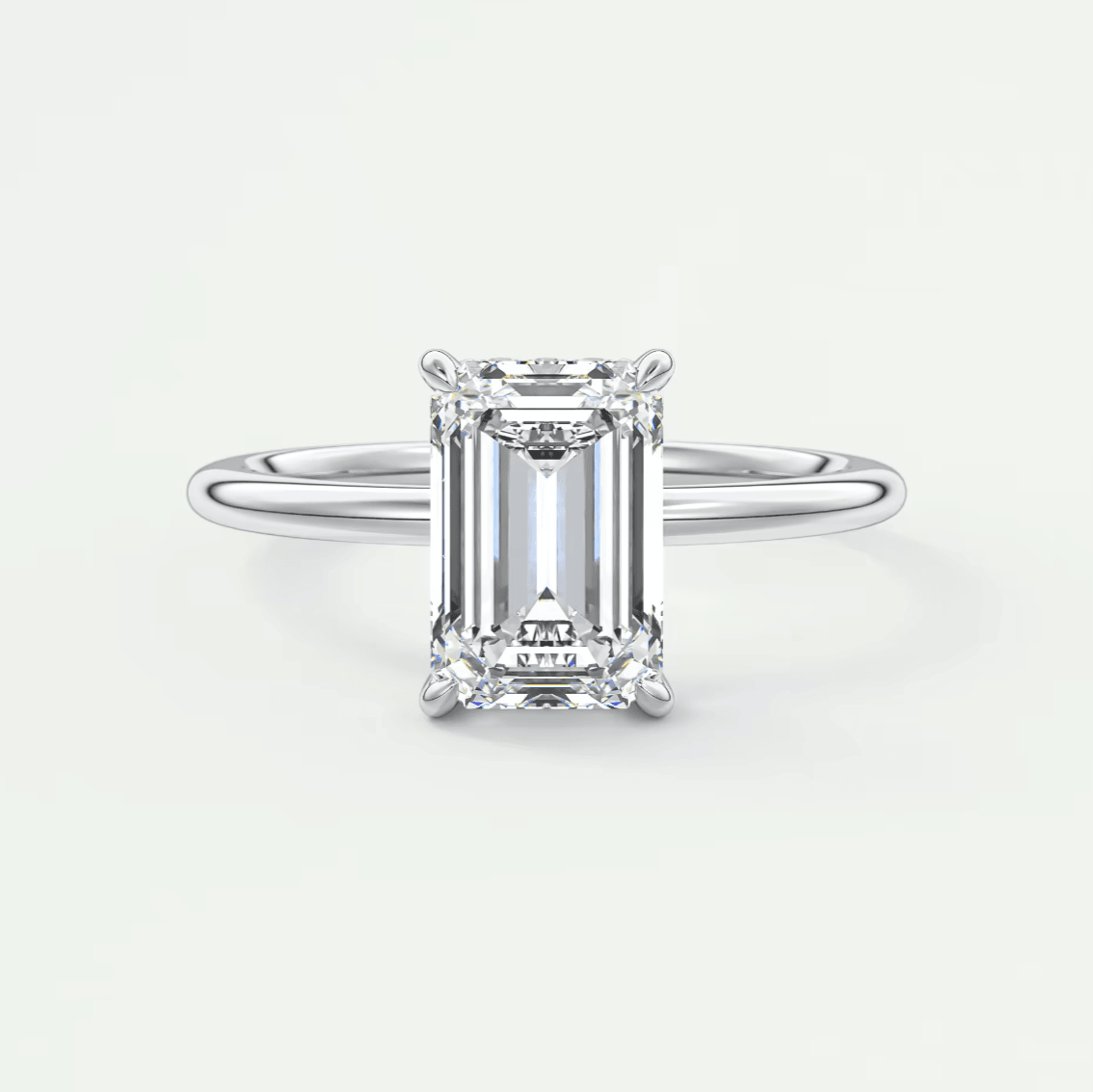 18k white gold emerald cut diamond engagement ring.