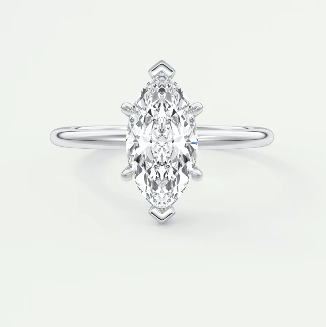 18k white gold marquise diamond engagement ring with a classic solitaire design.
