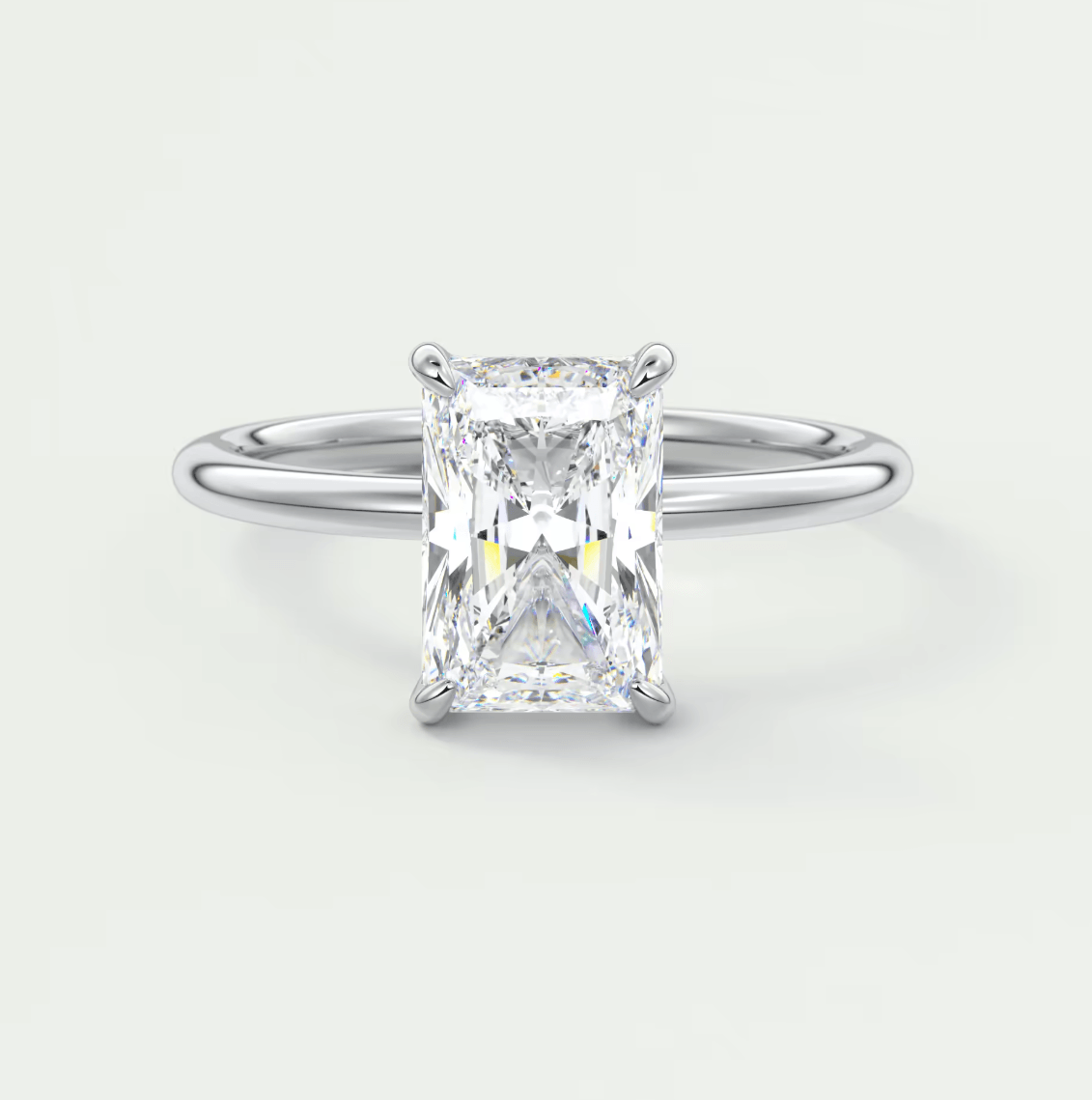 18k white gold emerald cut diamond engagement ring.