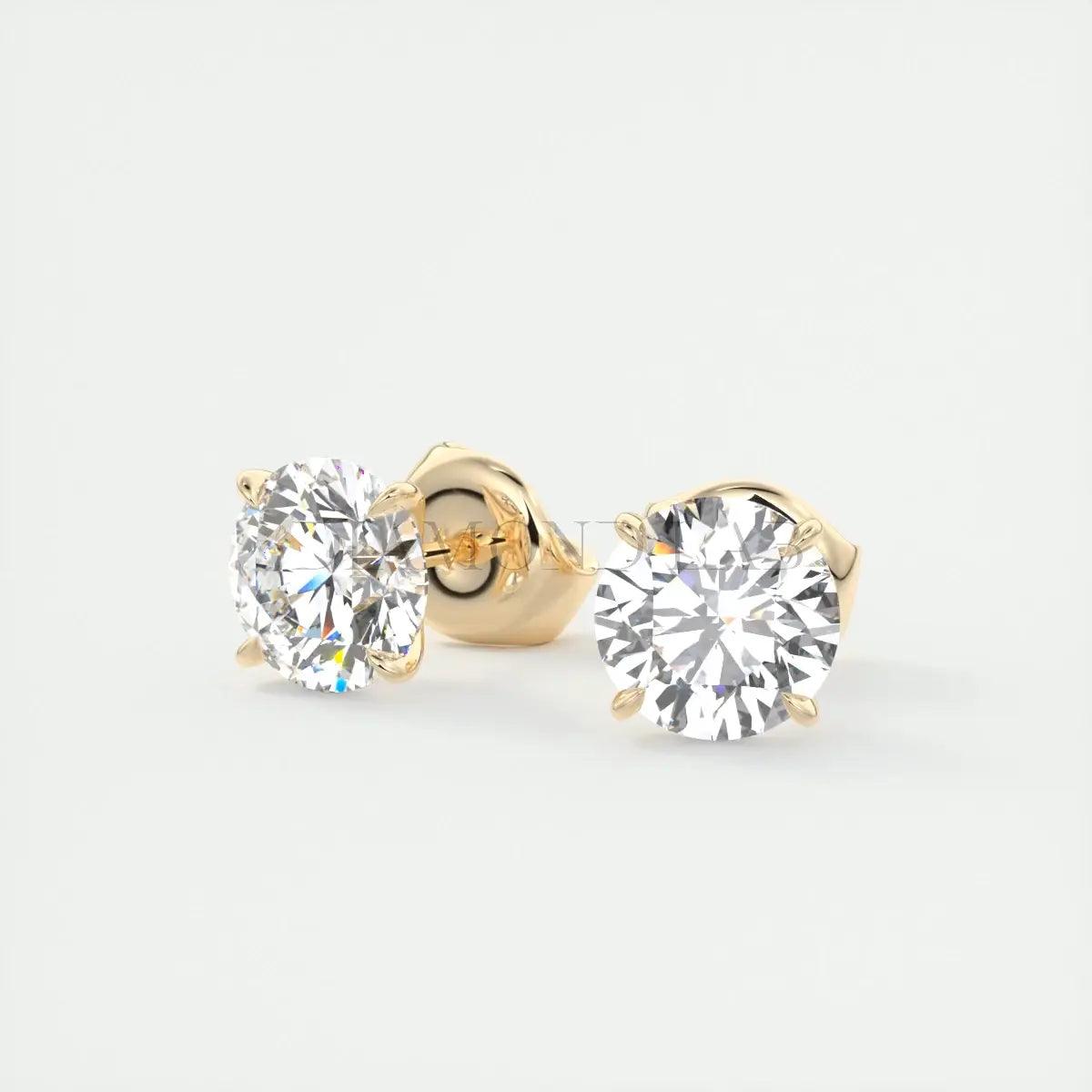 14k gold diamond stud earrings with a classic round cut.