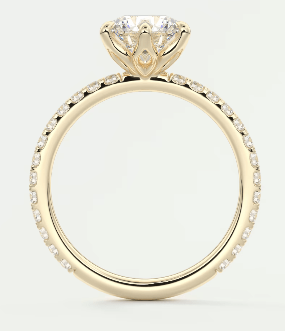 18k yellow gold diamond engagement ring with a halo design.