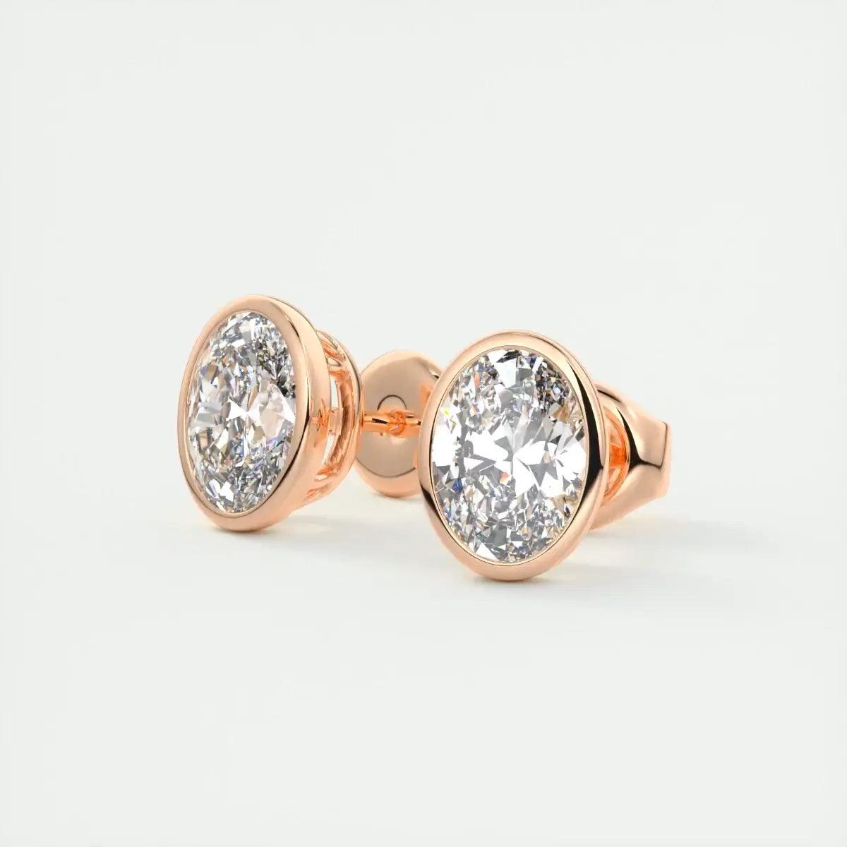 18k rose gold diamond stud earrings.