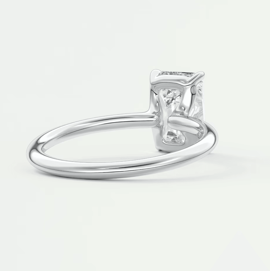 Silver diamond engagement ring with a solitaire setting.