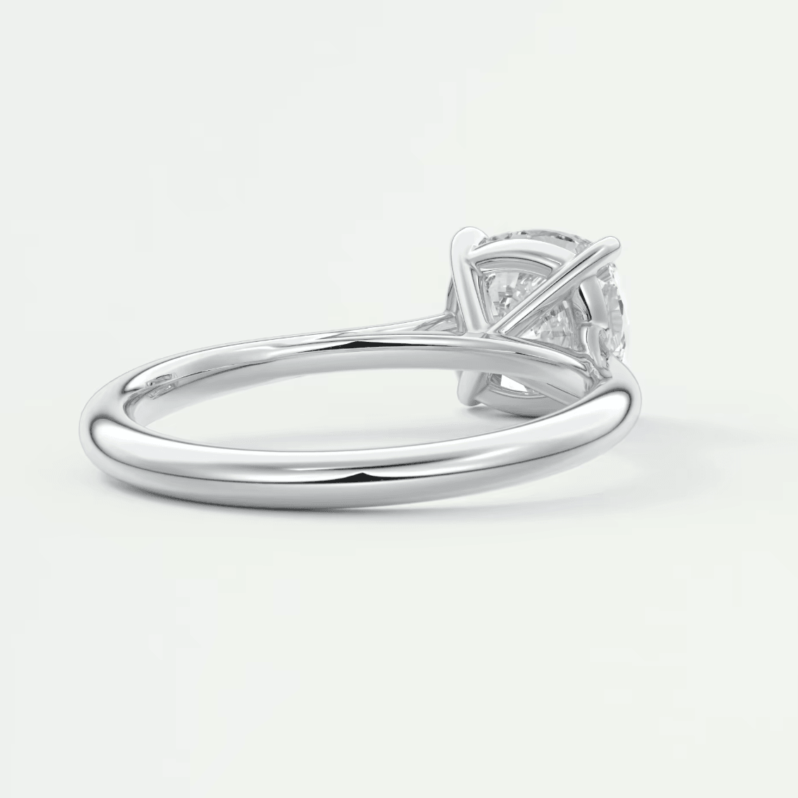 18-karat white gold engagement ring with a princess-cut diamond.
