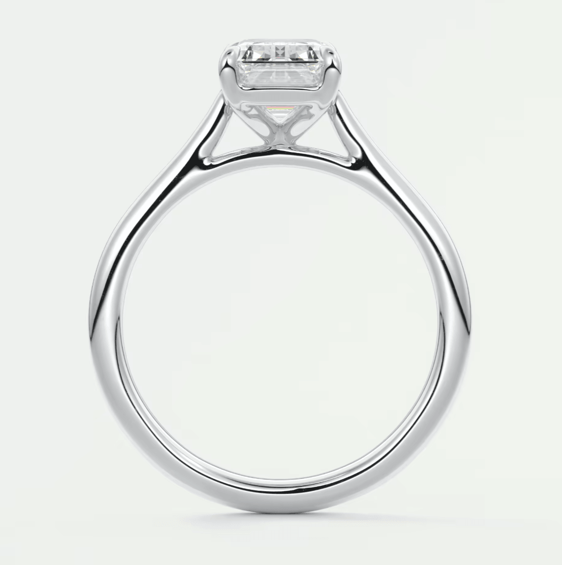 White gold engagement ring with a princess cut diamond.