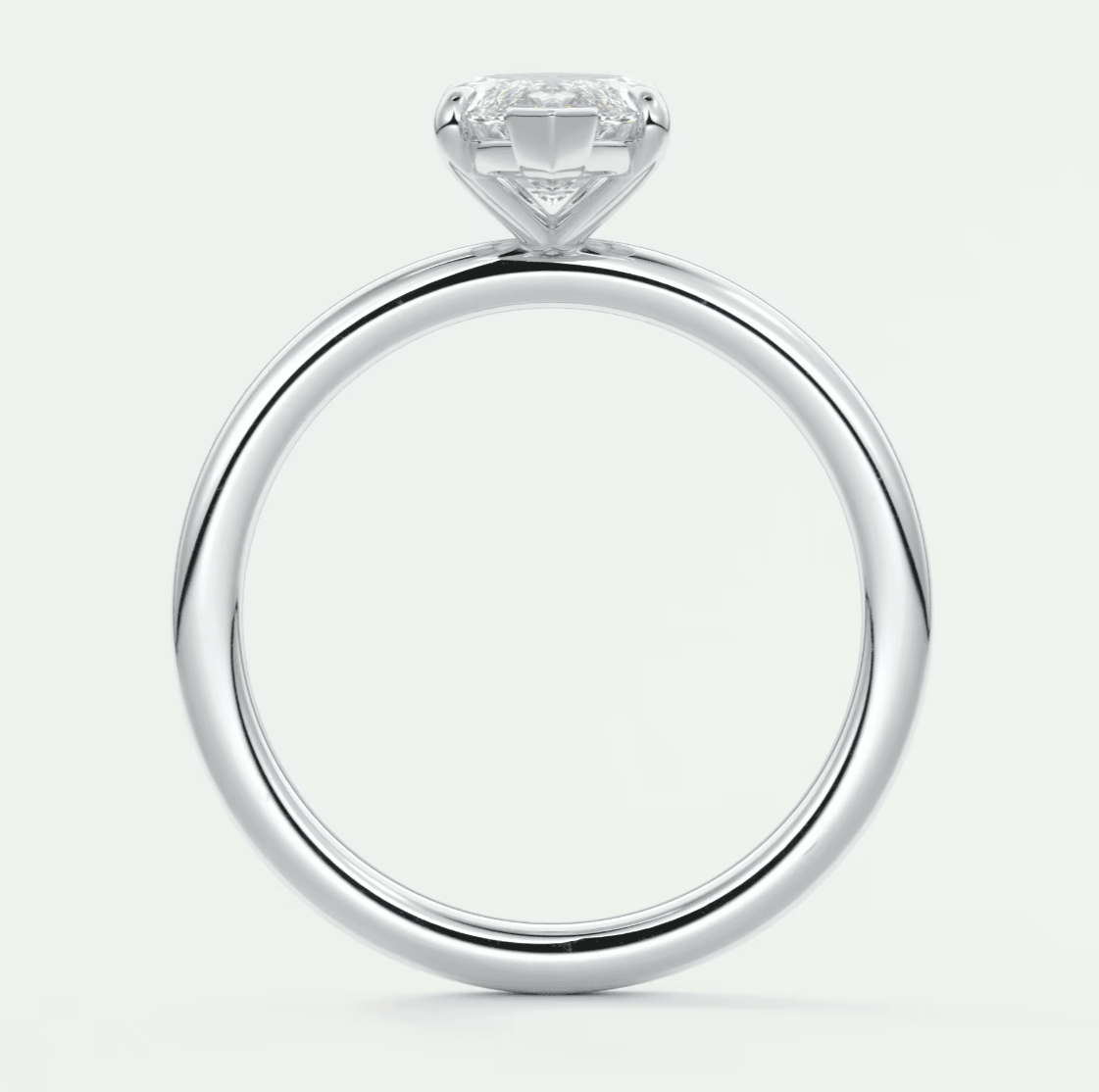 18k white gold engagement ring with a princess cut diamond.