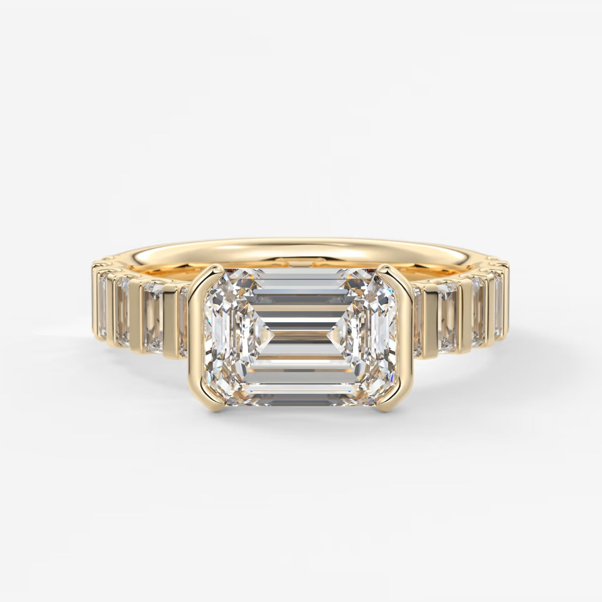 Solara grande east-west emerald half-bezel engagement ring