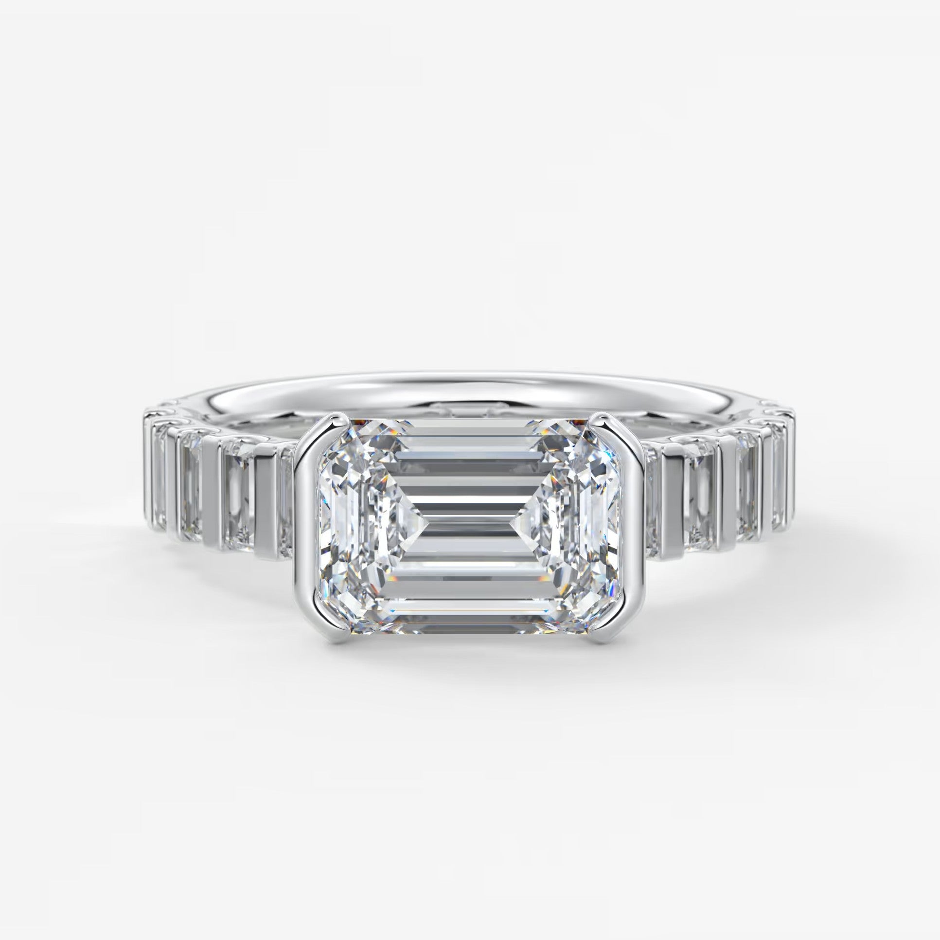 Solara grande east-west emerald half-bezel engagement ring
