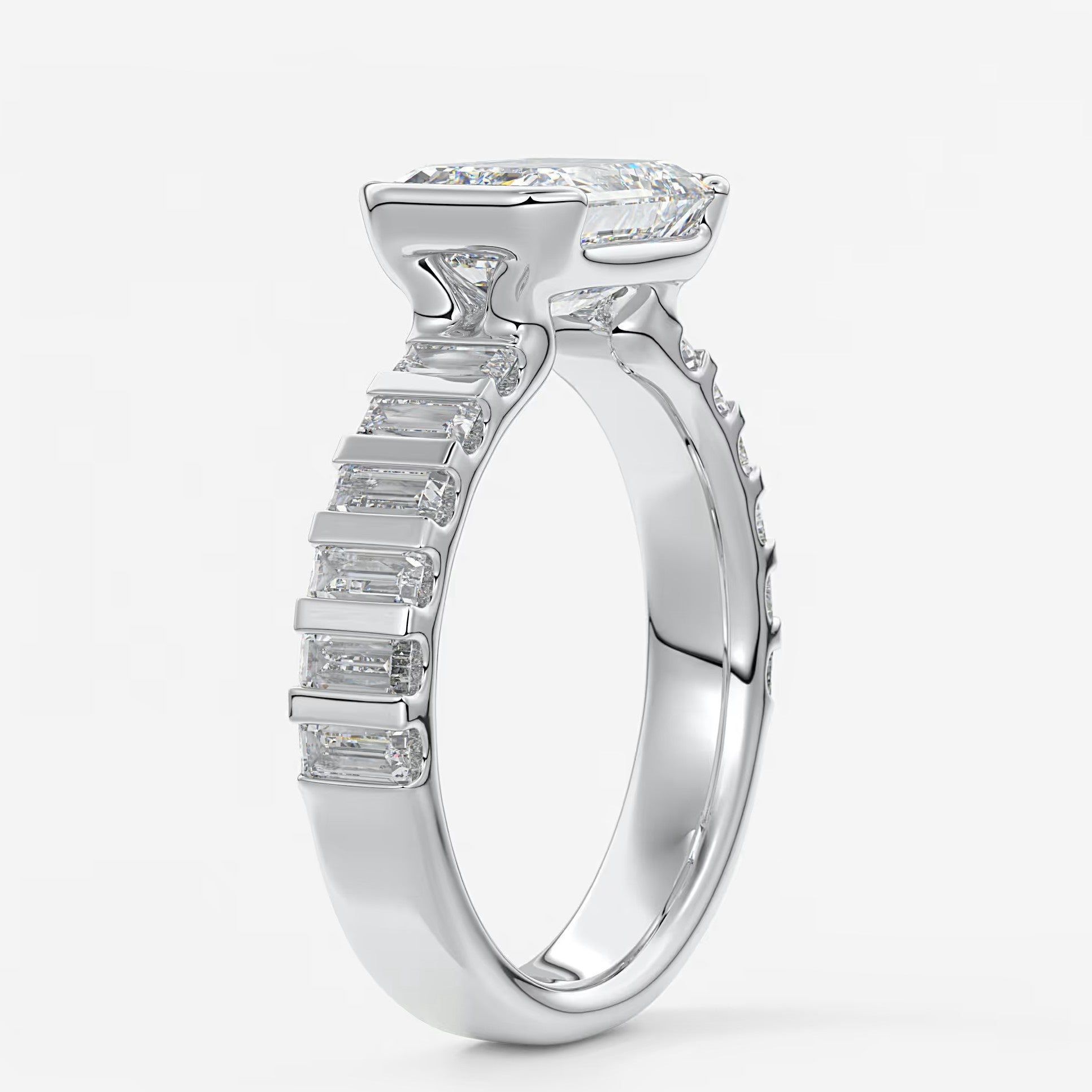 Solara grande east-west emerald half-bezel engagement ring