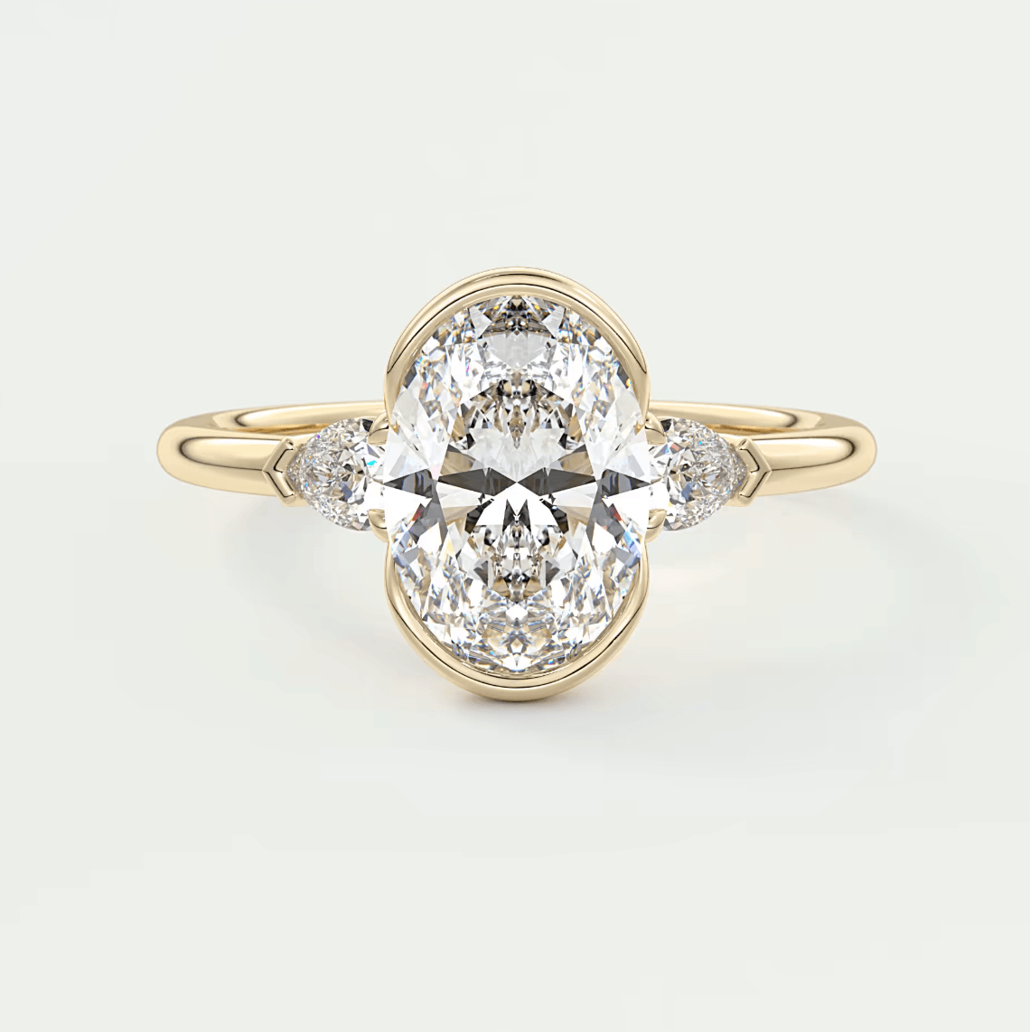 18k yellow gold engagement ring with an oval diamond center and small diamonds on the band.