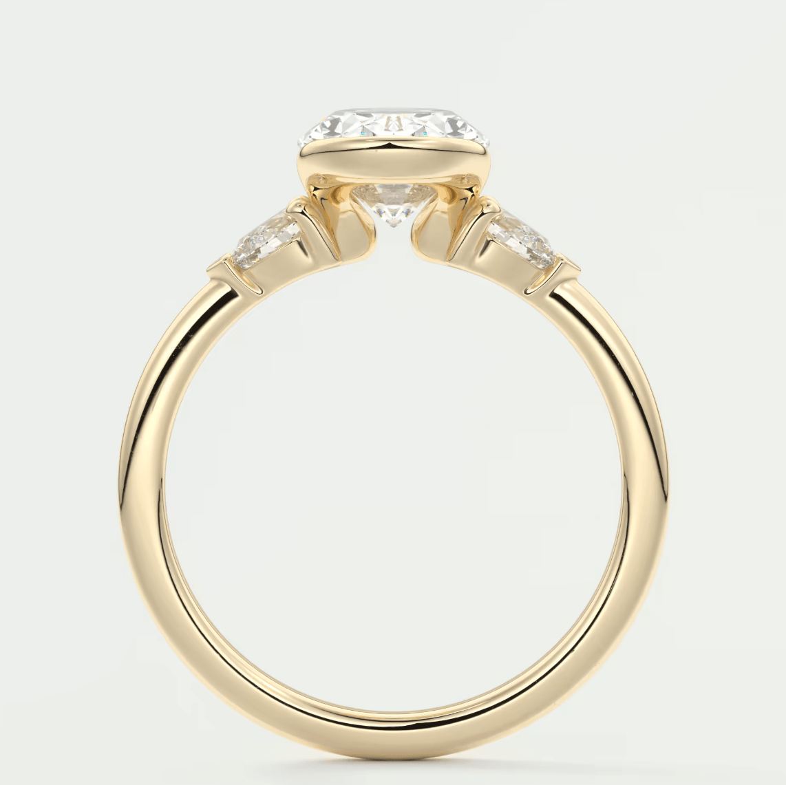 18k yellow gold engagement ring with a cushion-cut diamond and two smaller diamonds on each side.