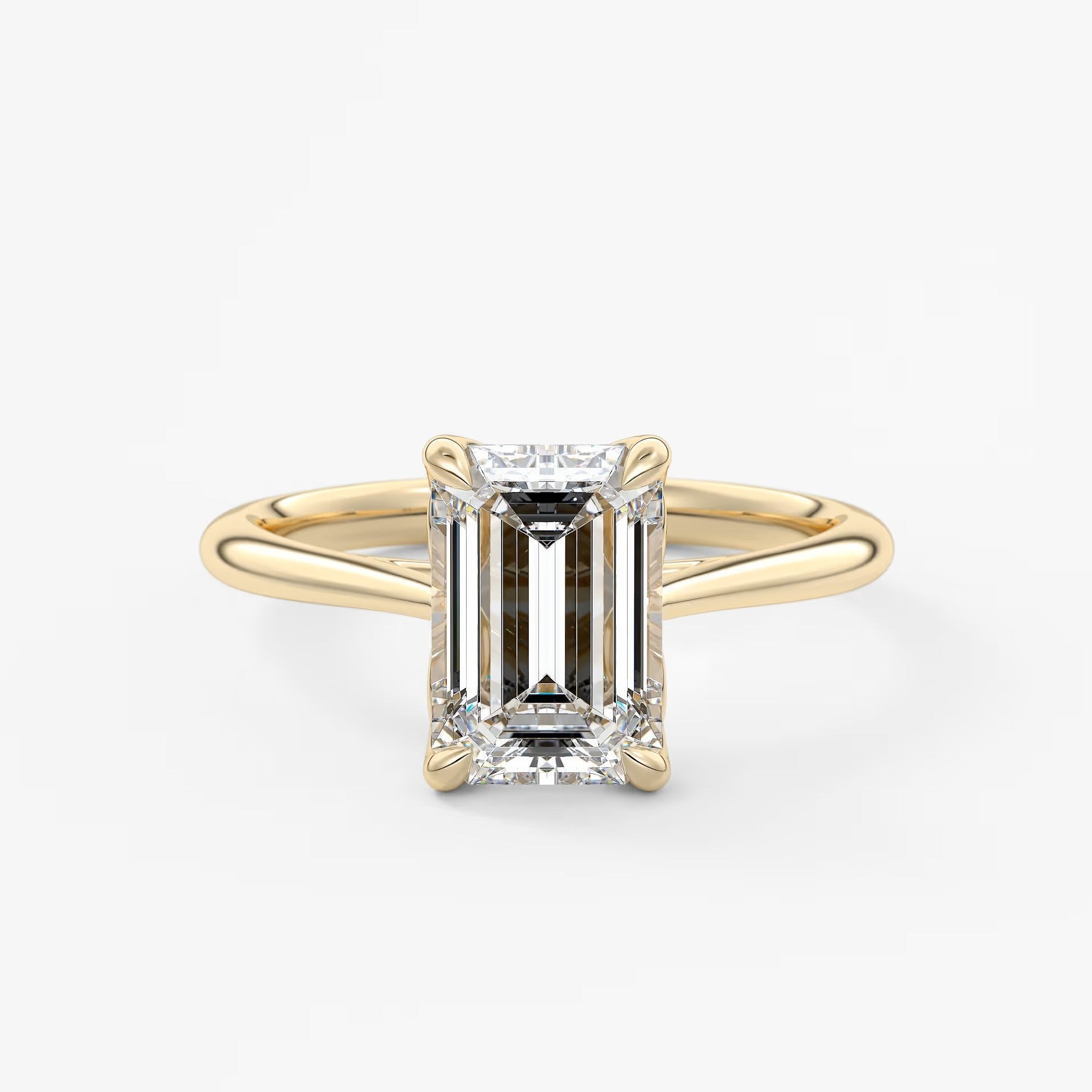 Tulip emerald cathedral engagement ring