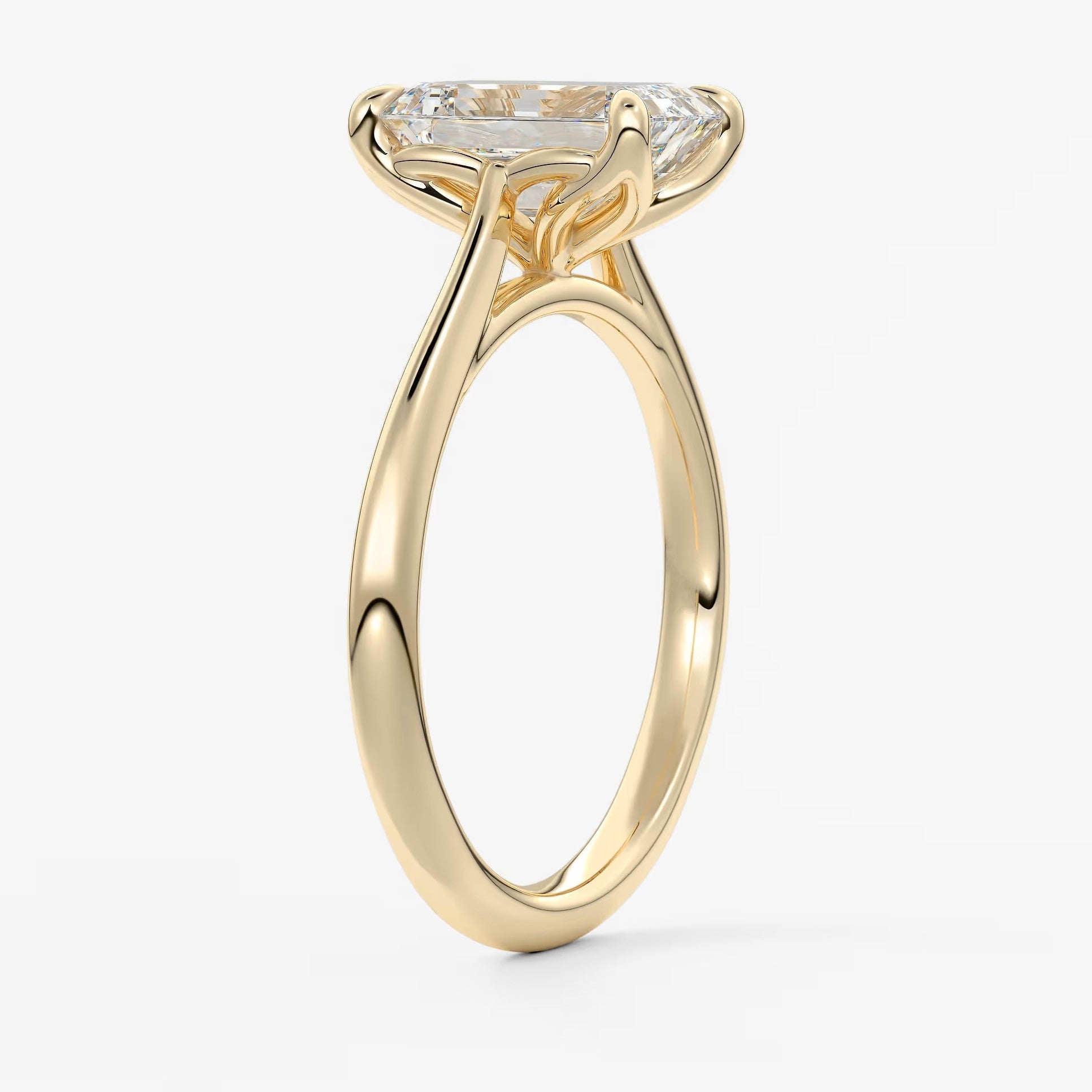 Tulip emerald cathedral engagement ring