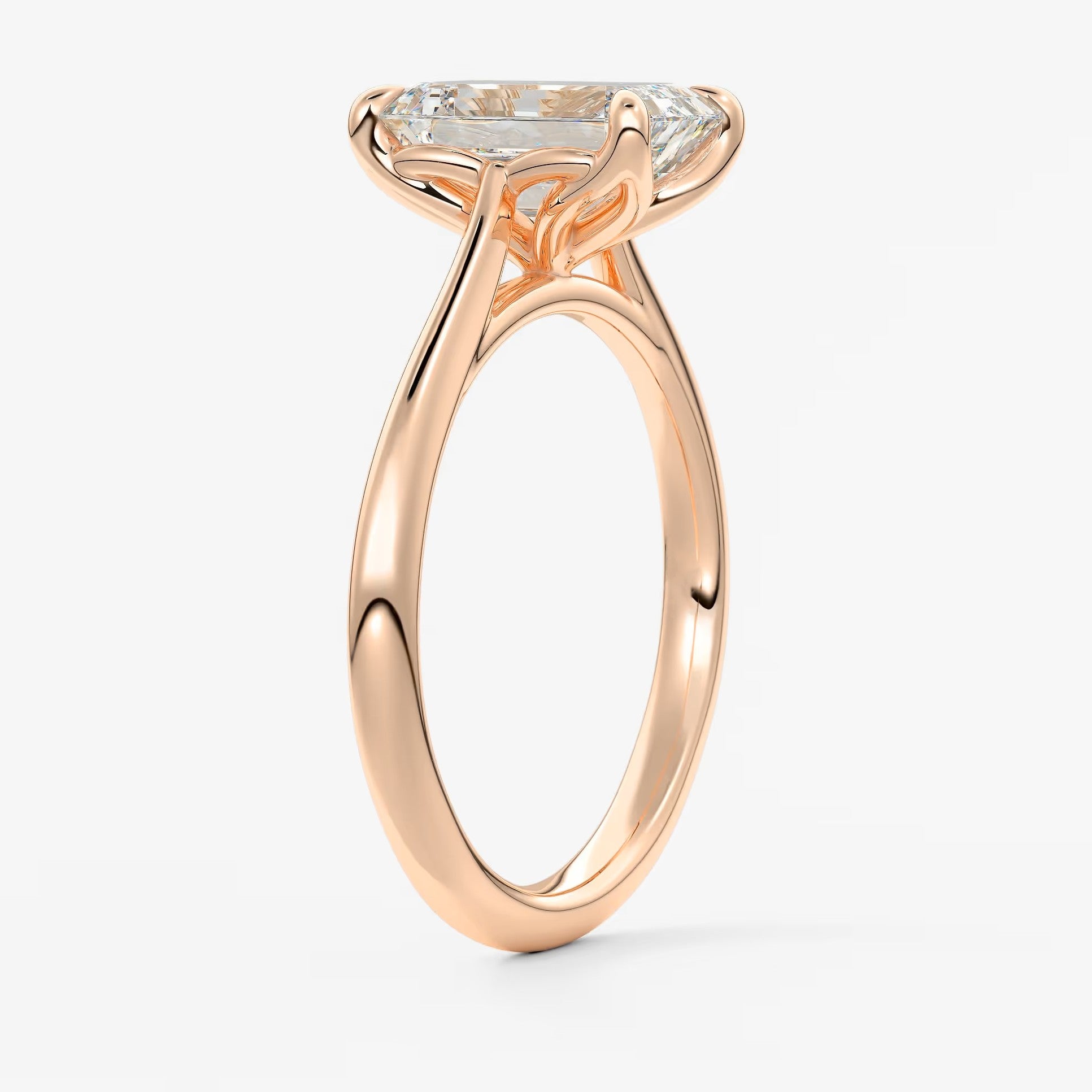Tulip emerald cathedral engagement ring