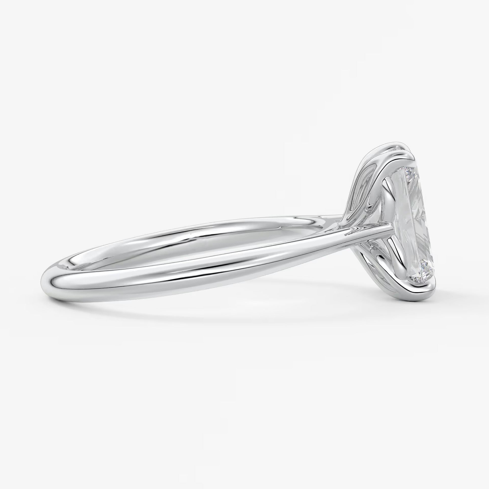 Tulip emerald cathedral engagement ring