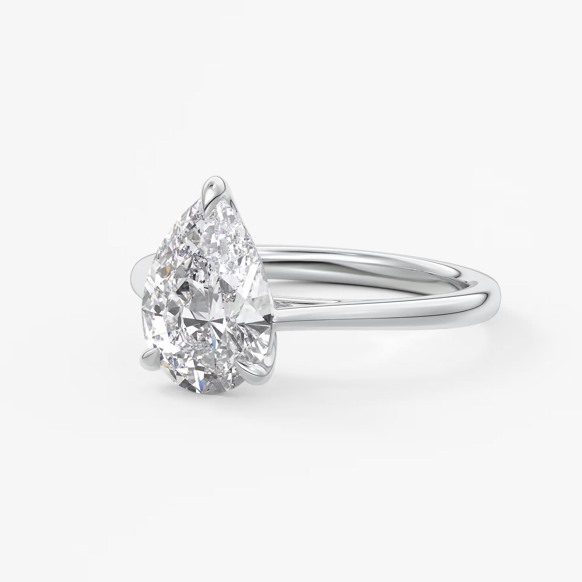 Tulip pear cathedral engagement ring