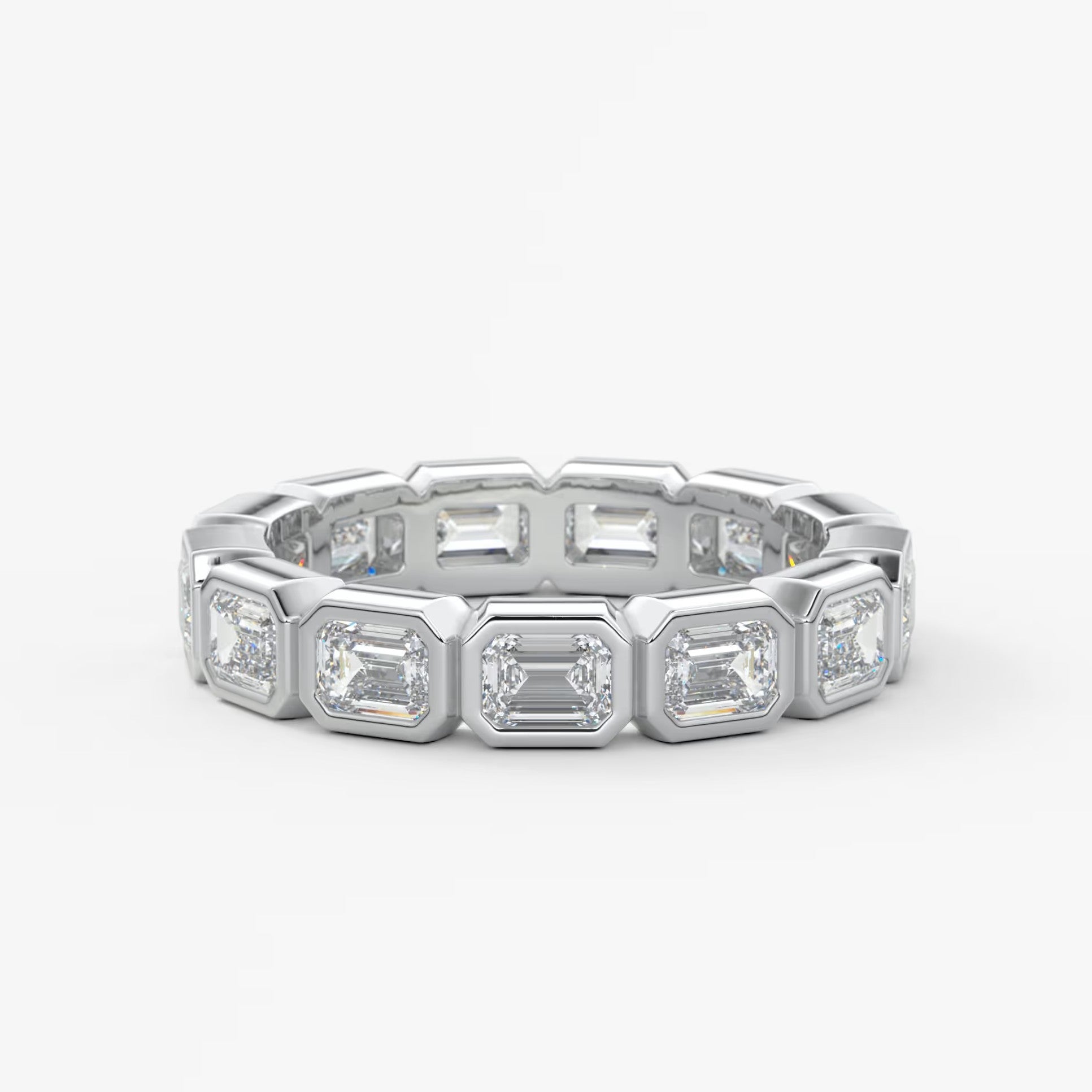 Valora east-west emerald bezel eternity band