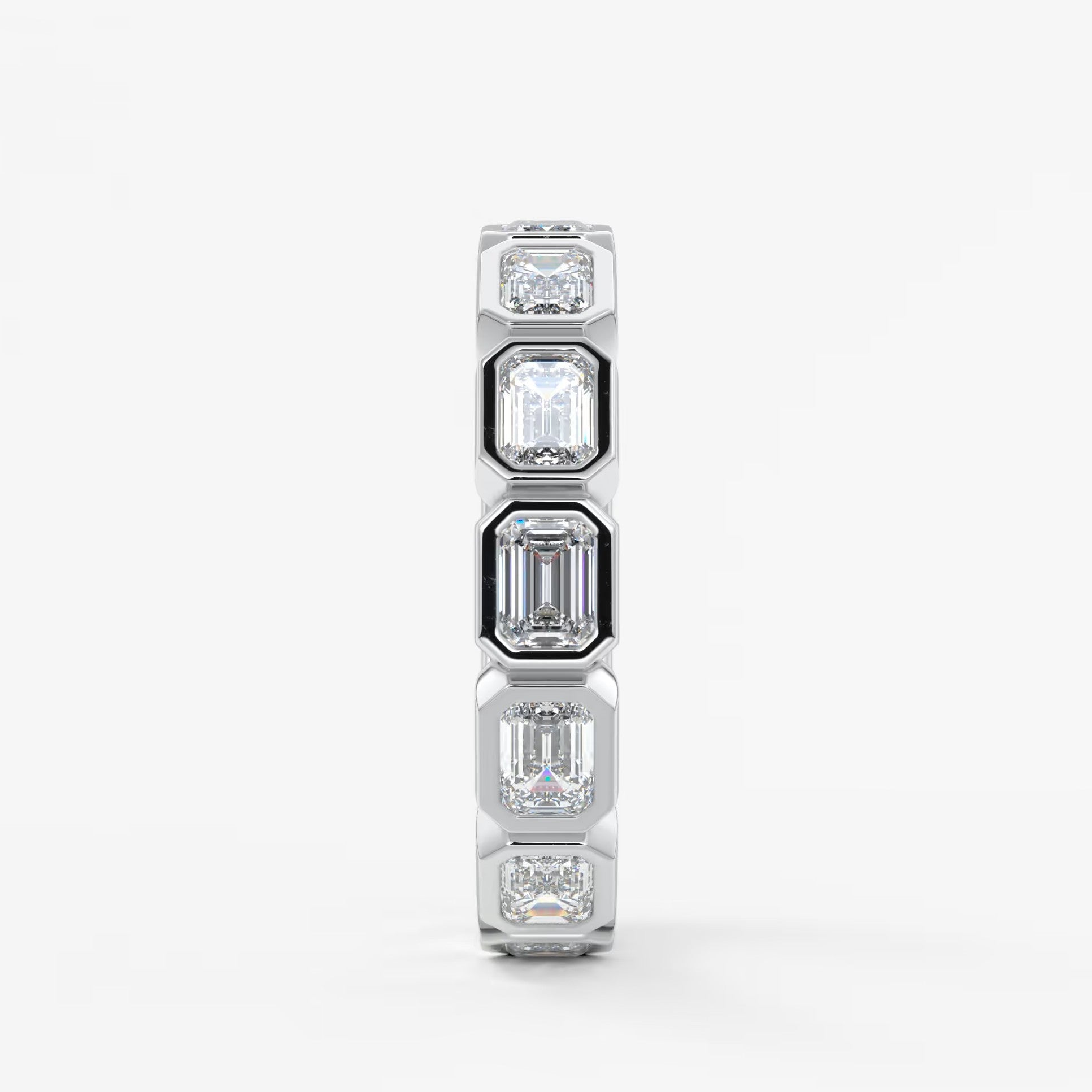 Valora east-west emerald bezel eternity band