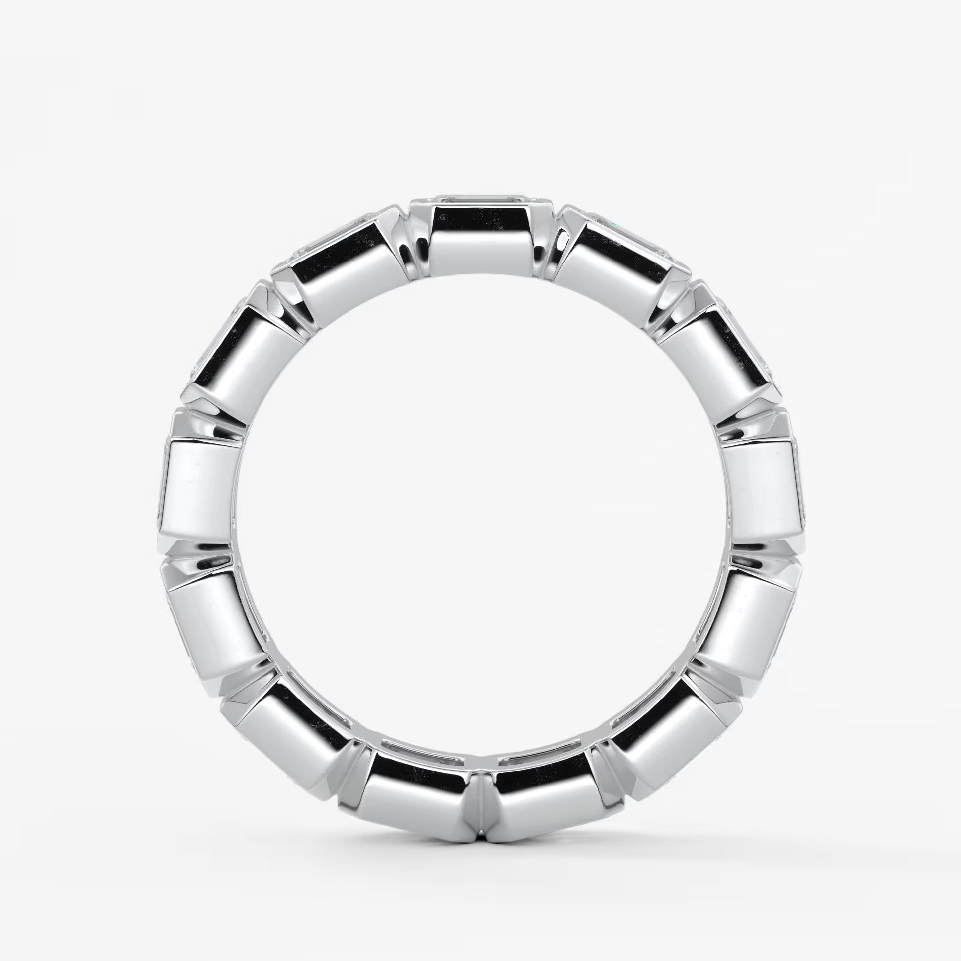Valora east-west emerald bezel eternity band