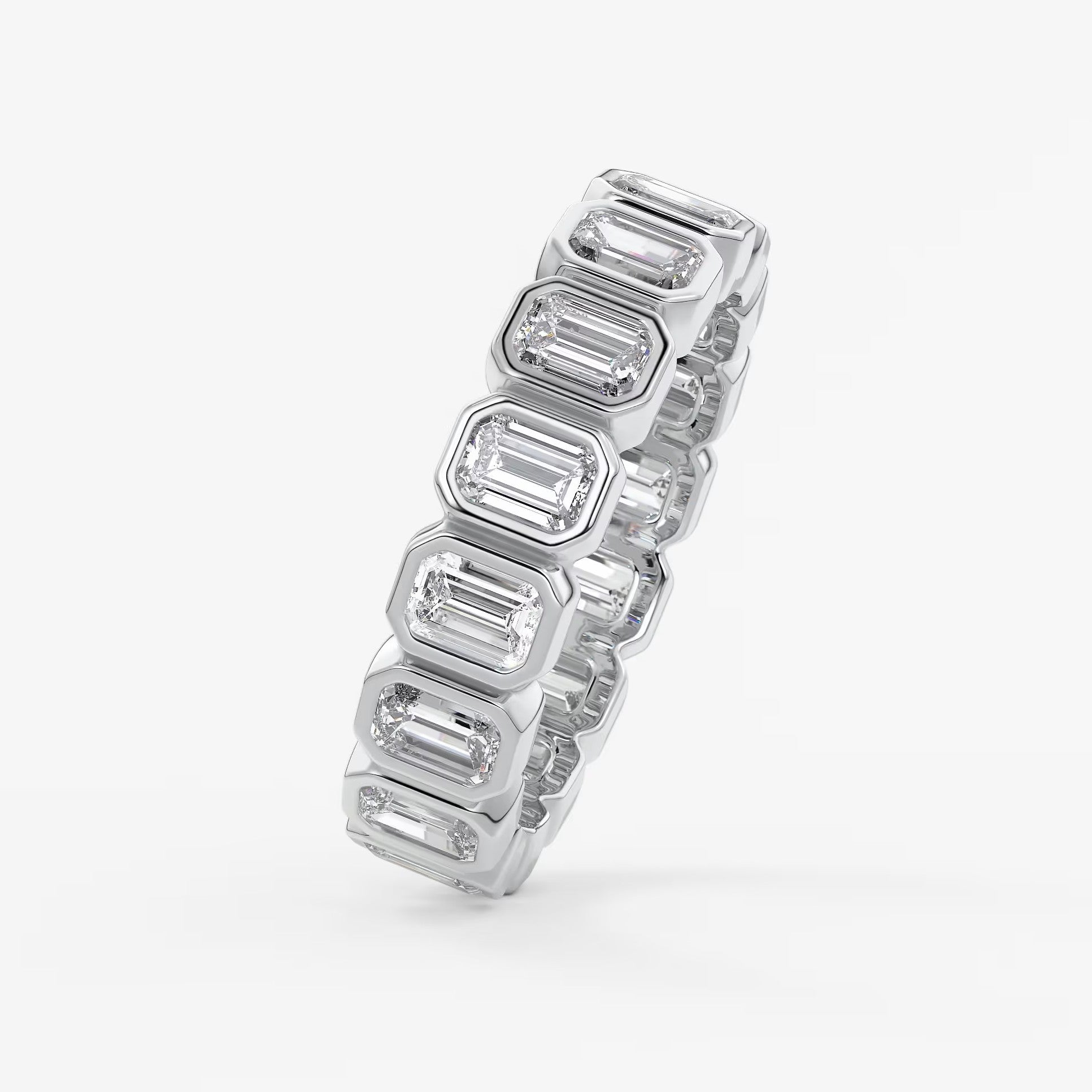 Valora emerald bezel eternity band