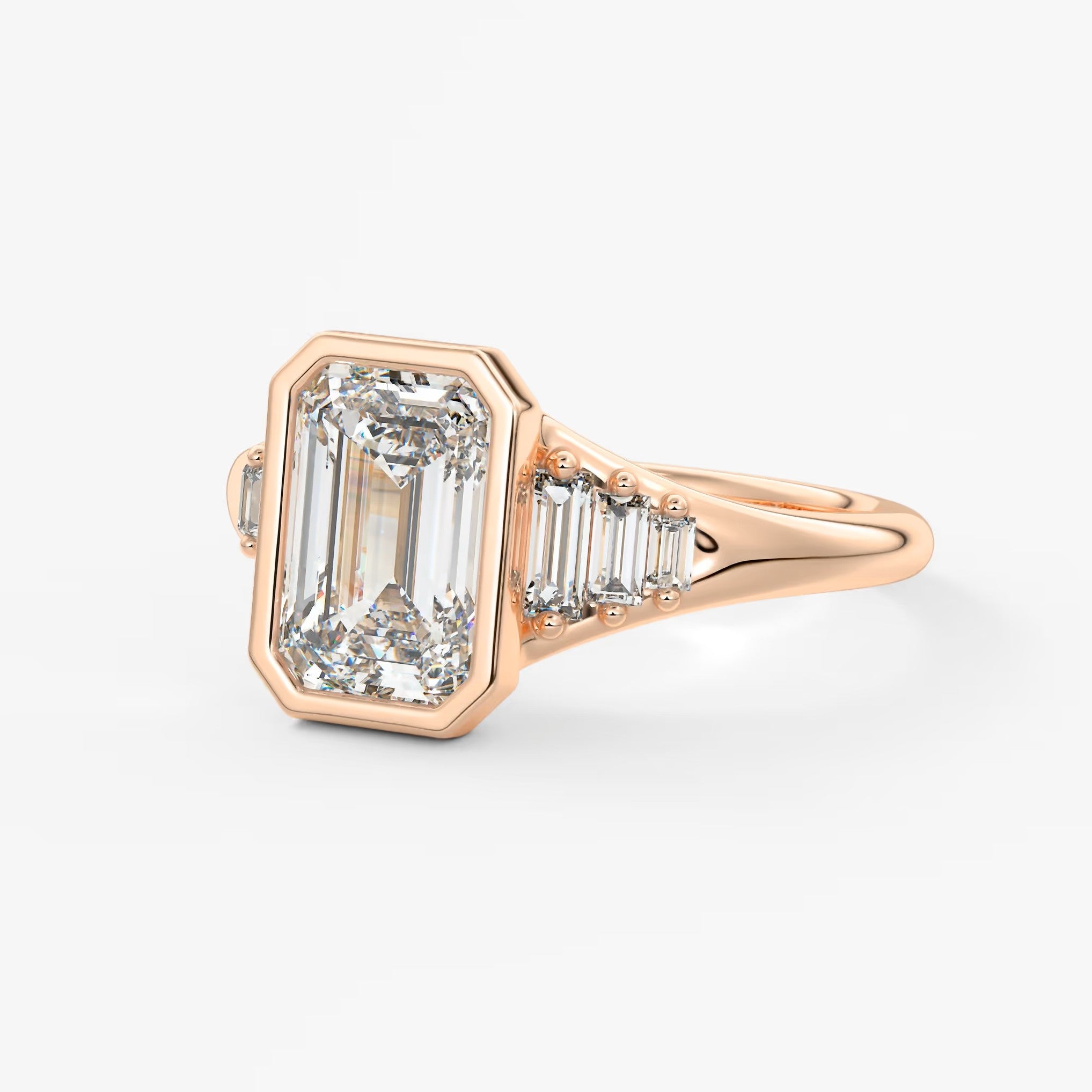 Véda emerald heirloom – seven-stone graduated baguette ring