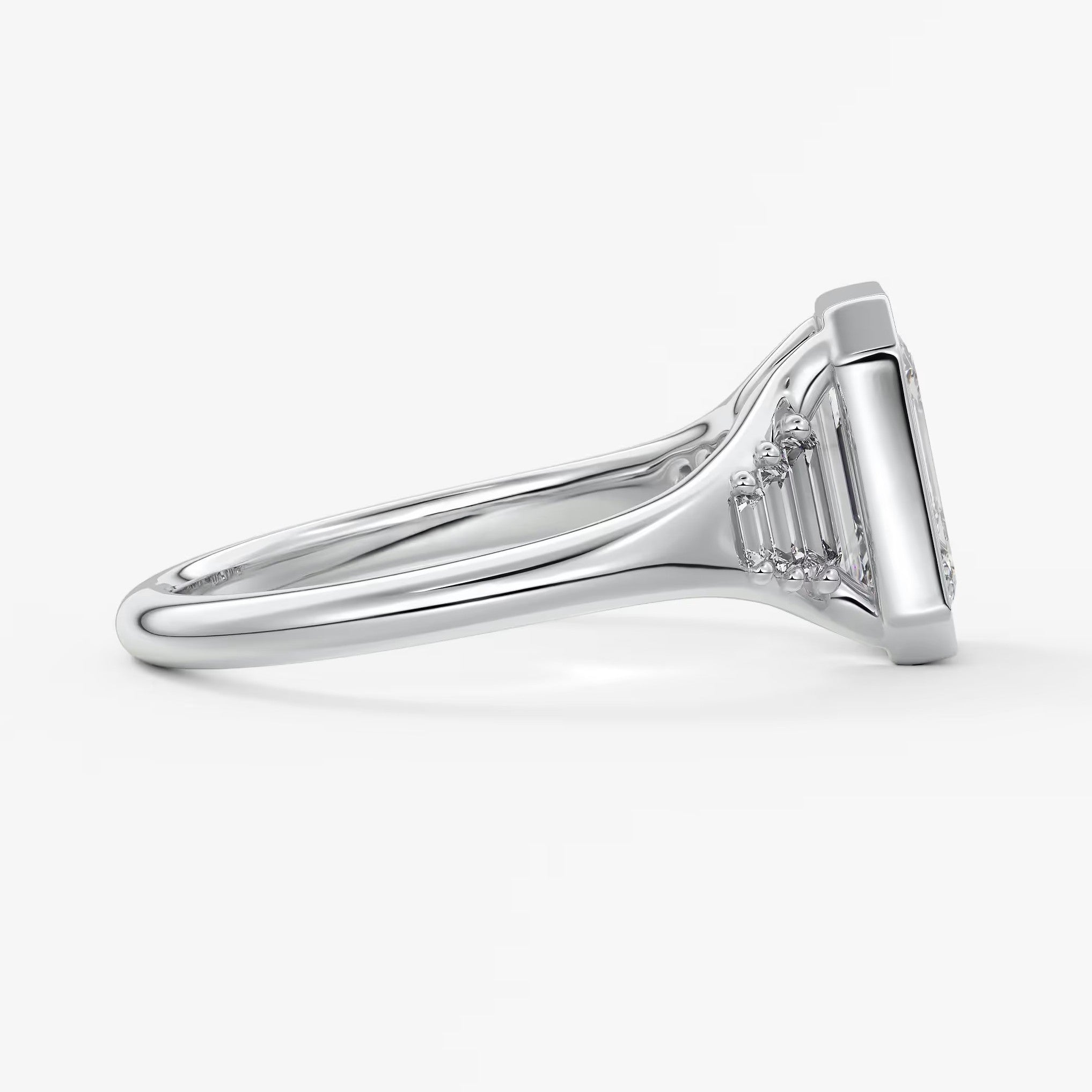 Véda emerald heirloom – seven-stone graduated baguette ring