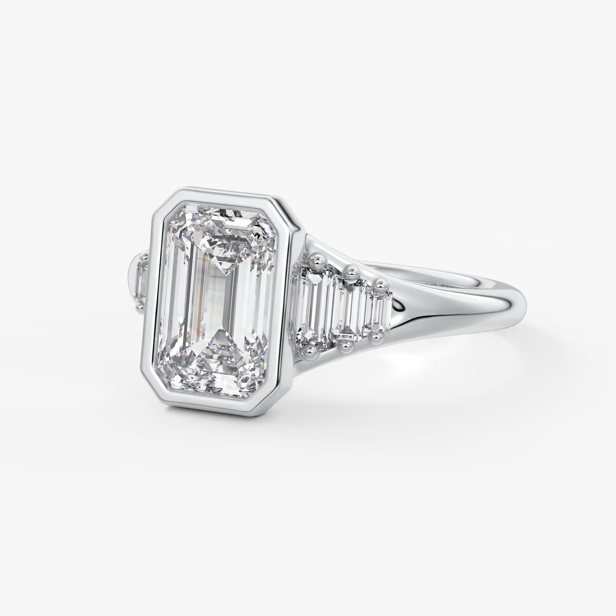 Véda emerald heirloom – seven-stone graduated baguette ring