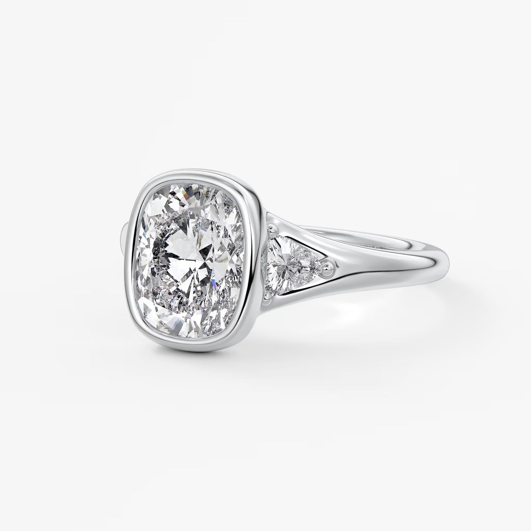 Véda trilogy – cushion with trillion side stone split shank engagement ring