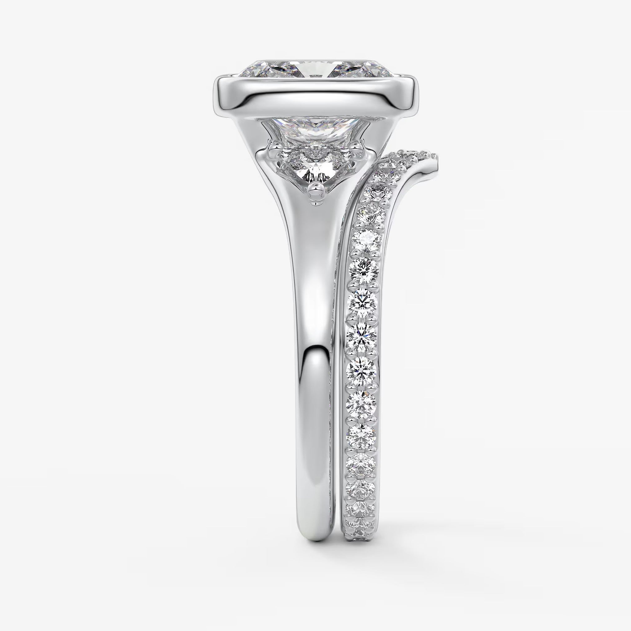 Véda trilogy – cushion with trillion side stone split shank engagement ring