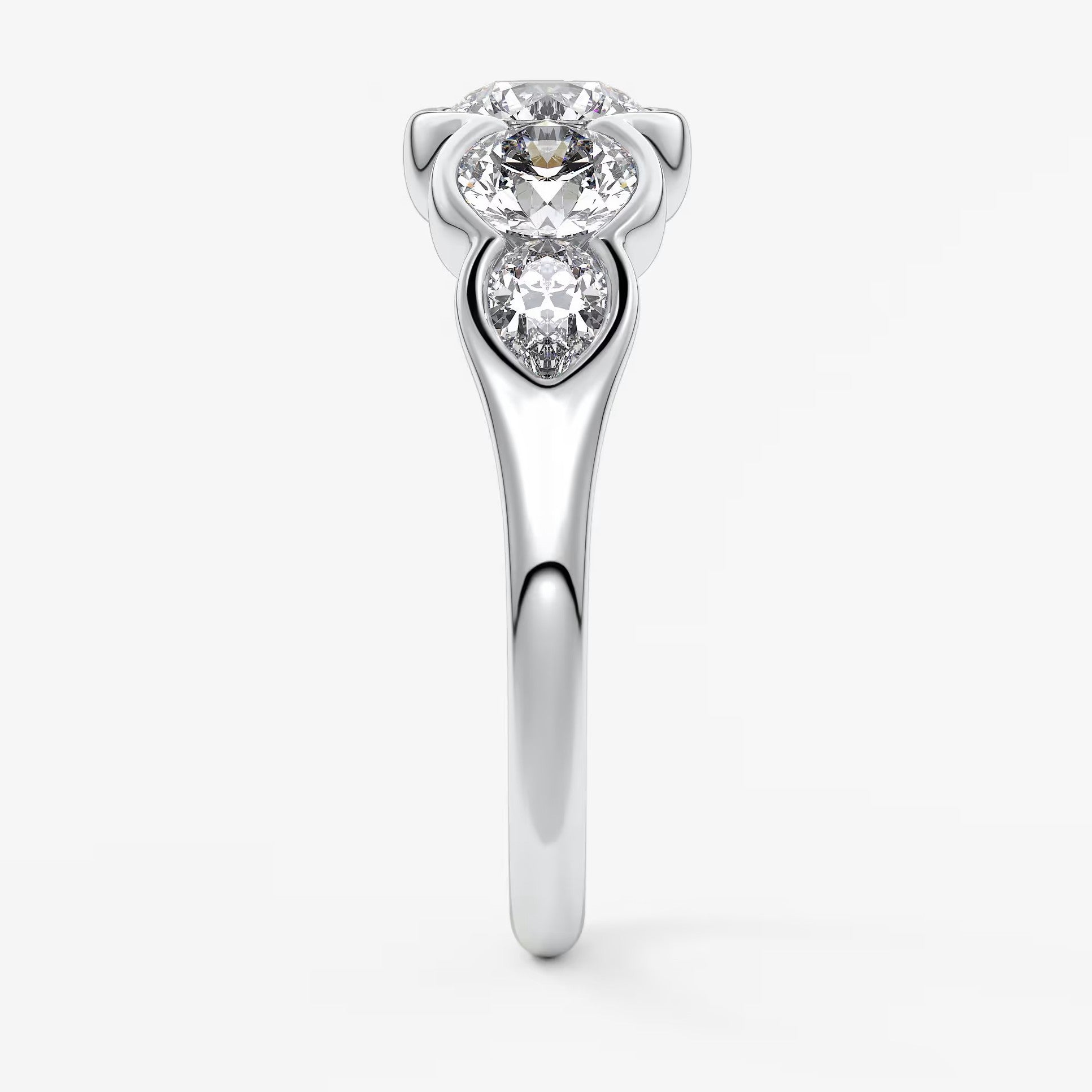 Virelle round and pear half-bezel engagement ring