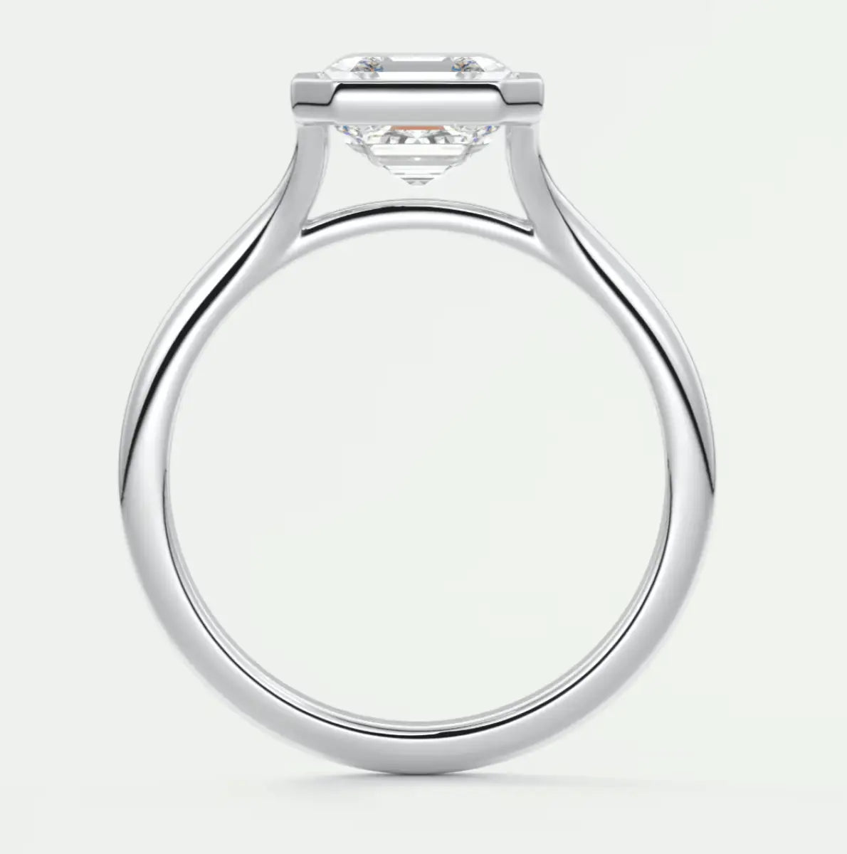 18-karat white gold engagement ring with a princess-cut diamond.