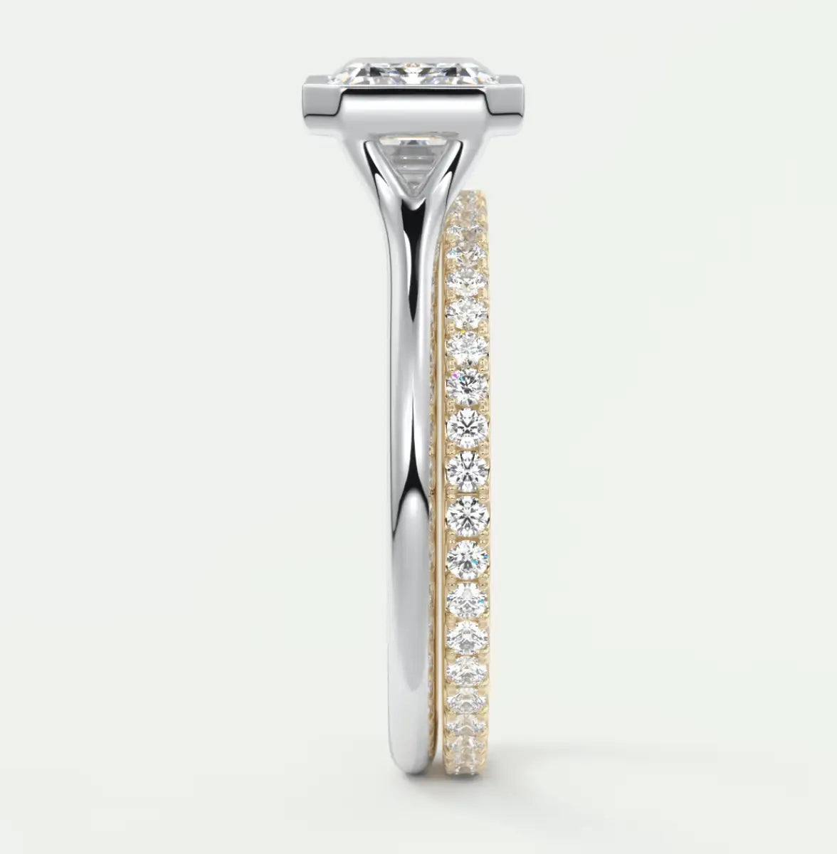 18k gold and diamond engagement ring with a square-shaped center stone.