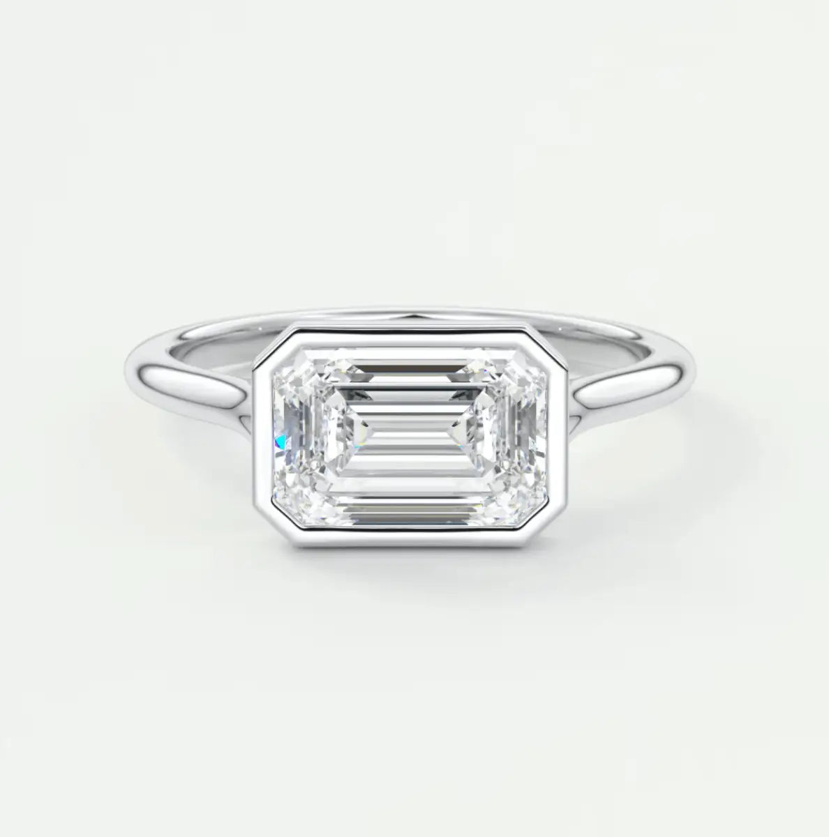18k white gold emerald cut diamond engagement ring.