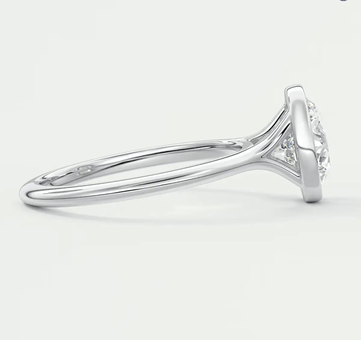 18k white gold diamond engagement ring with a halo setting.