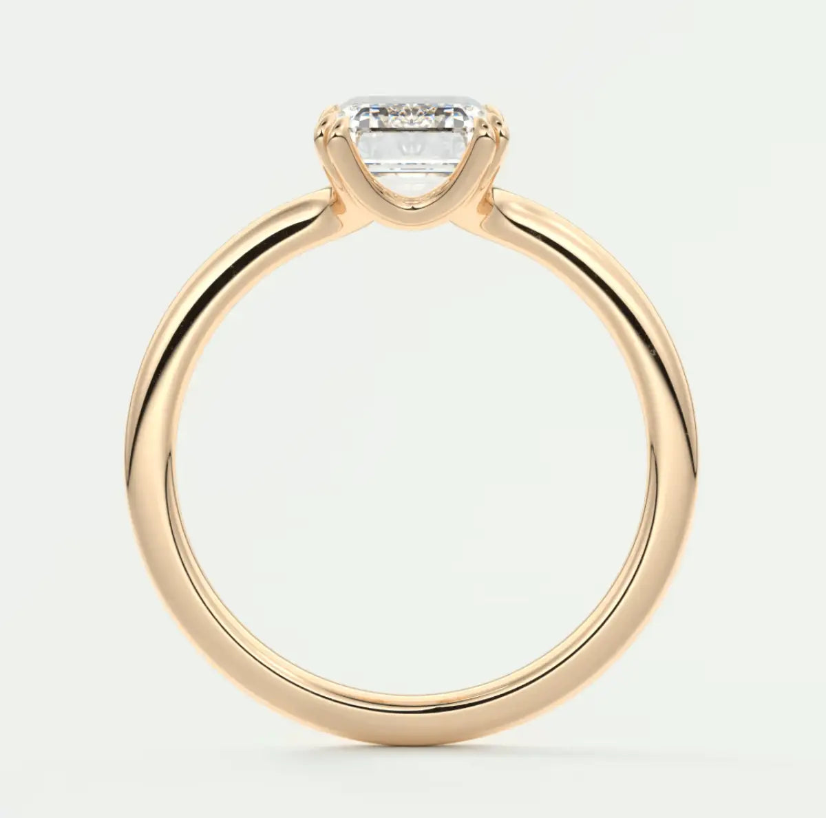 18k gold engagement ring with a princess cut diamond.