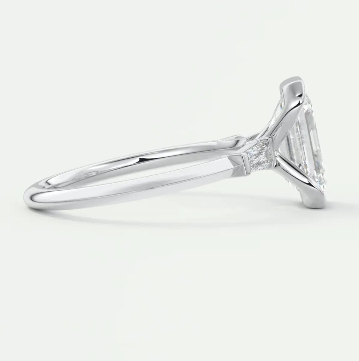 Custom made solara baguette emerald three-stone engagement ring | diamond lab