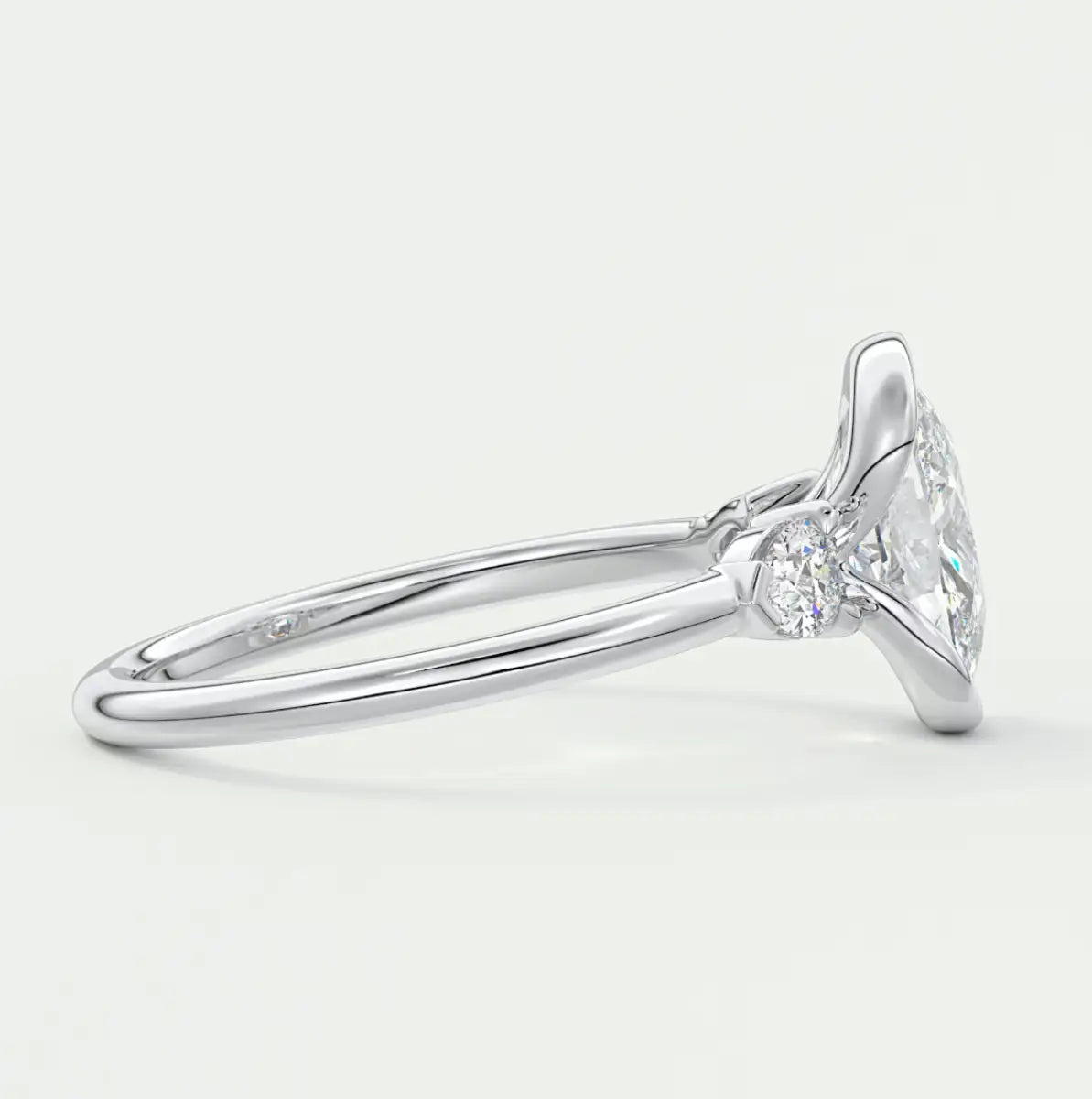 Custom made solara elongated cushion half bezel three-stone engagement ring | diamond lab