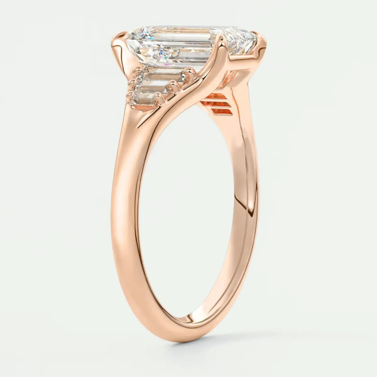 Custom made solena emerald split shank engagement ring with baguette side stones | diamond lab